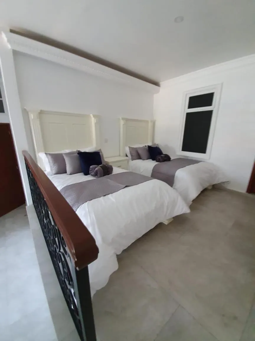 Bed in Hotel Estancia Real