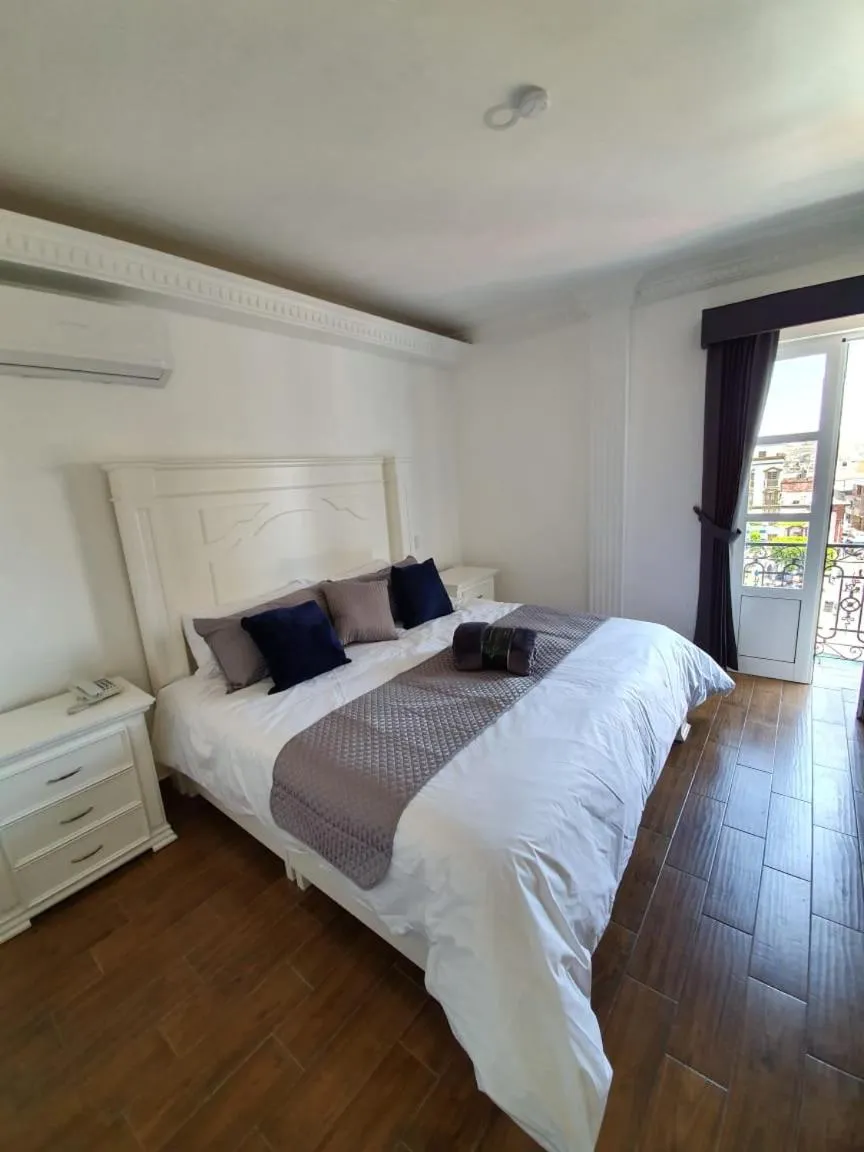 Bed in Hotel Estancia Real