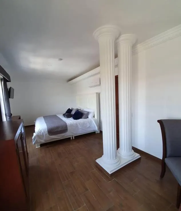 Bed in Hotel Estancia Real