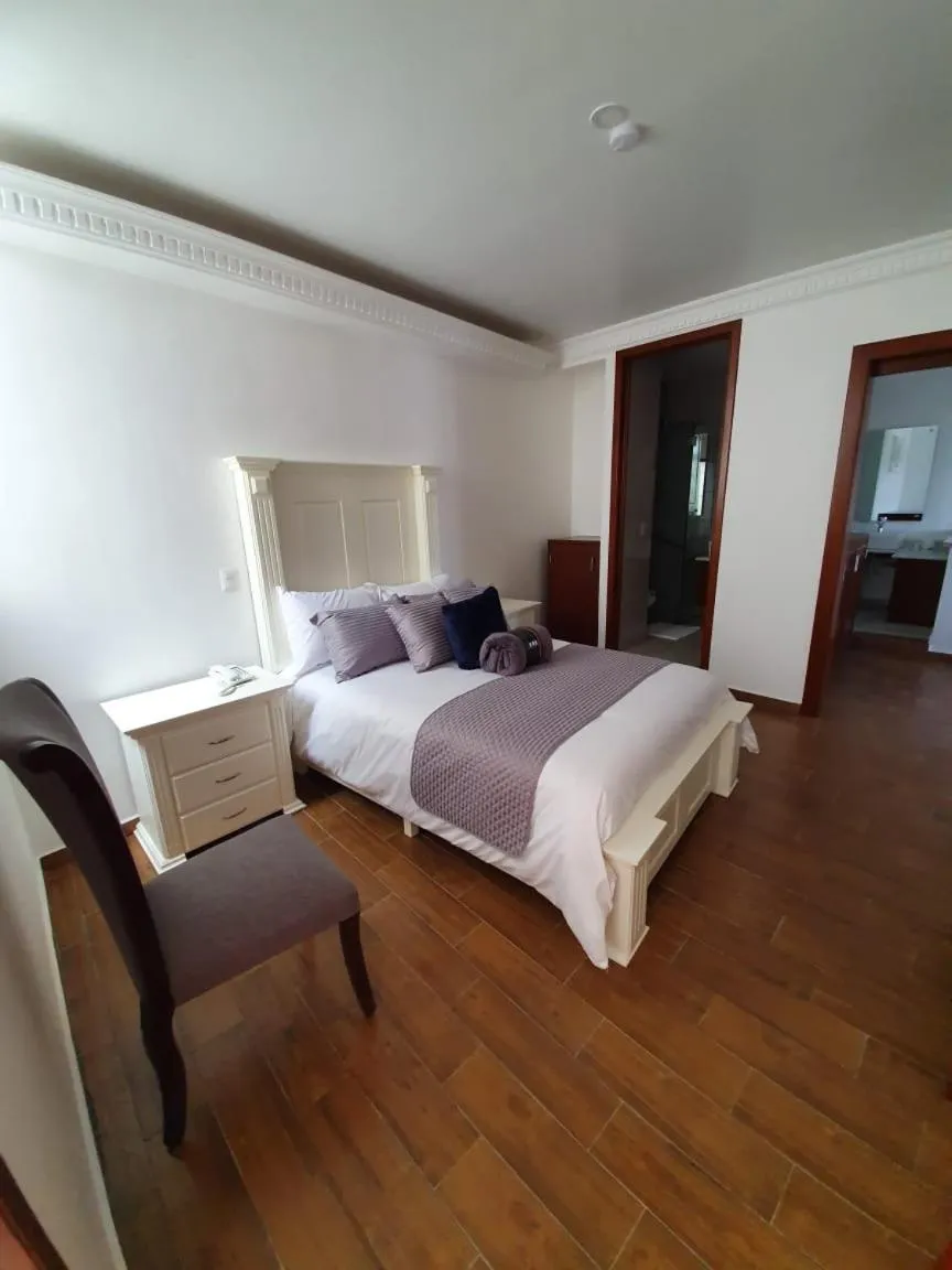 Bed in Hotel Estancia Real