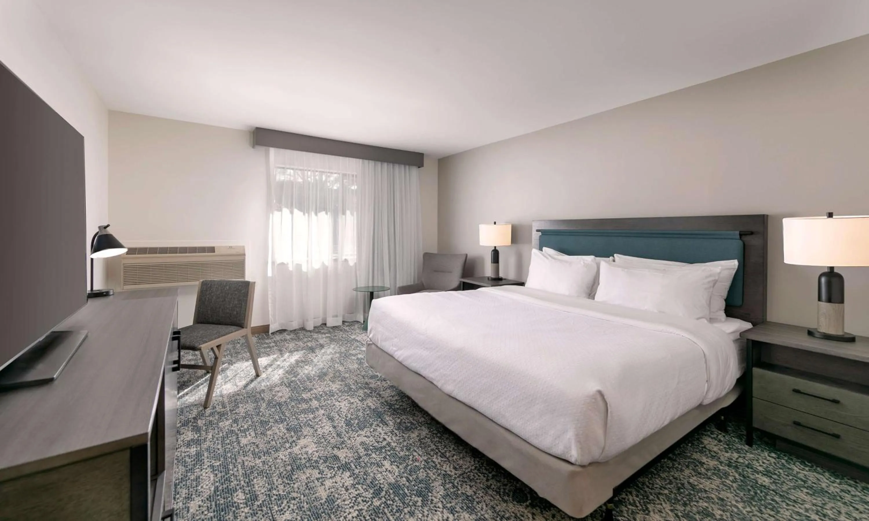 Bed in Seacliff Inn Aptos, Tapestry Collection by Hilton