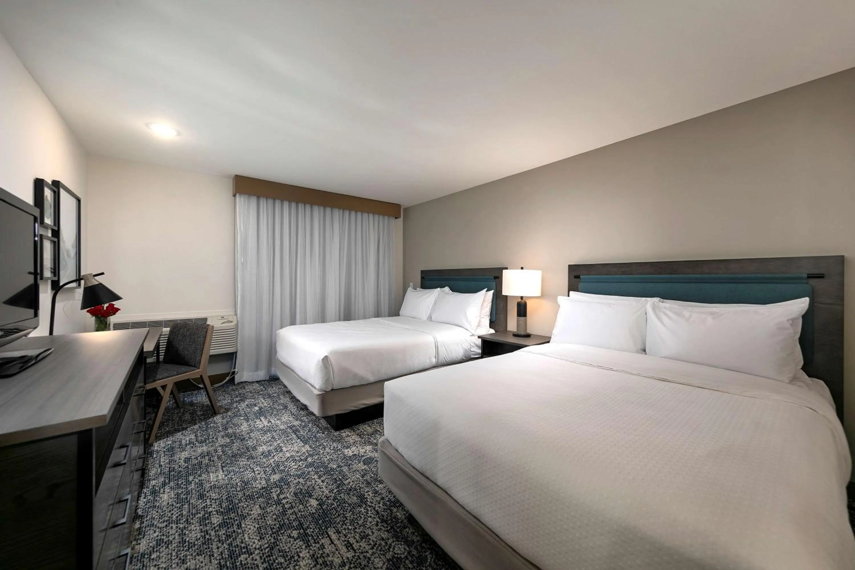 Bed in Seacliff Inn Aptos, Tapestry Collection by Hilton