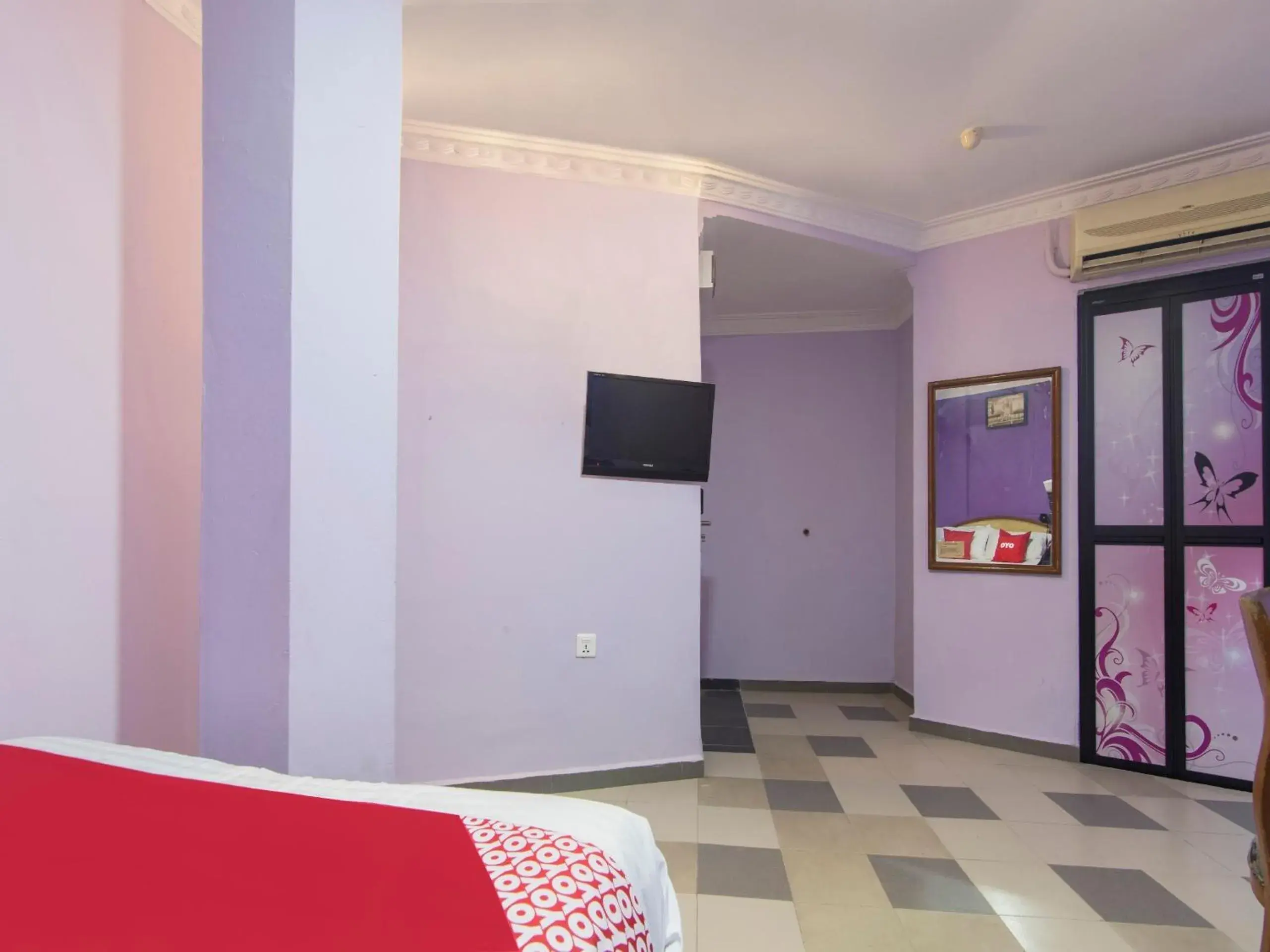 Bedroom in Hotel O Sri Muda Corner Sdn Bhd Bedroom in Hotel O Sri Muda Corner Sdn Bhd