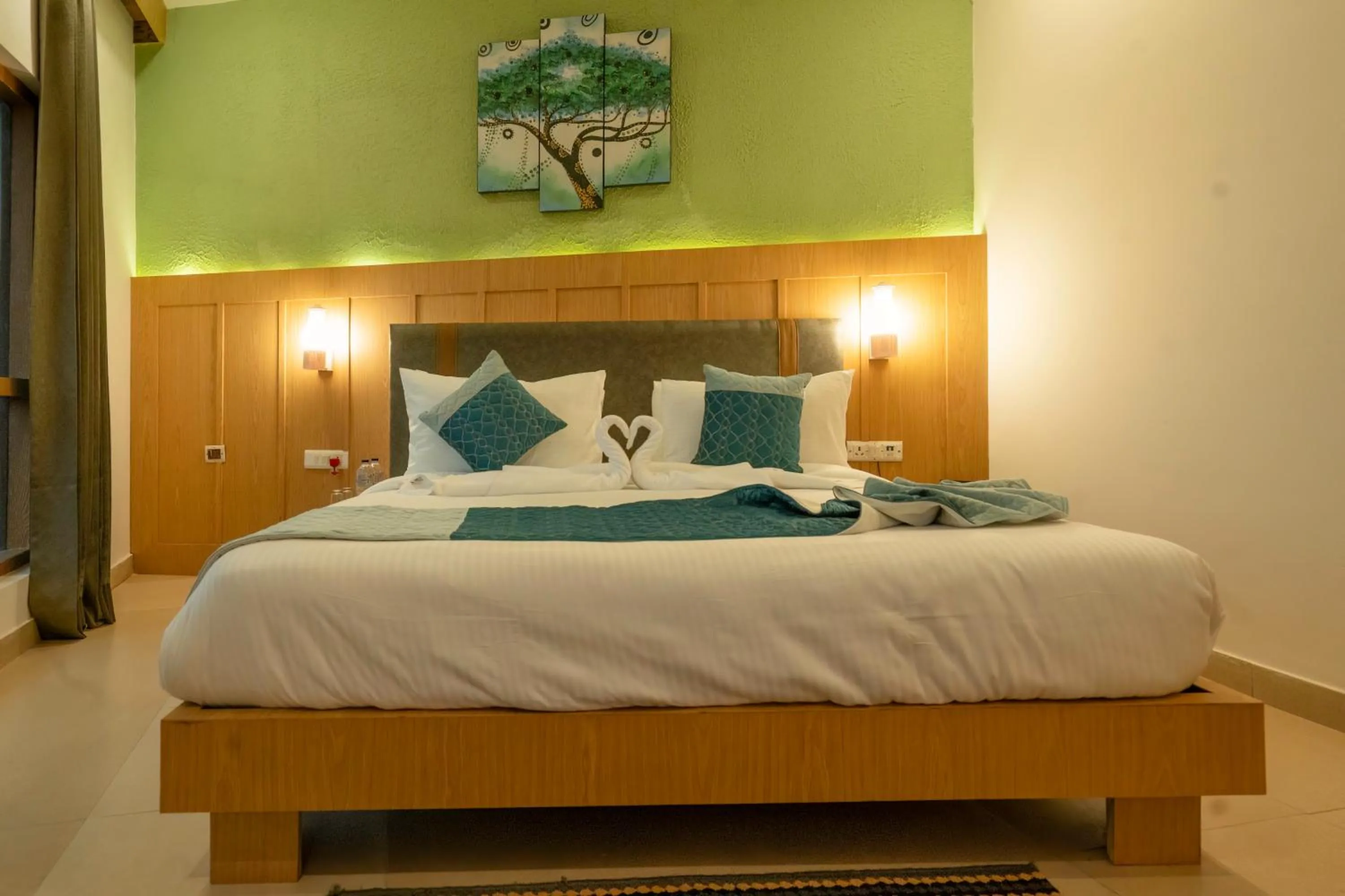 Bed in Excel Hotels and Resorts Bhimtal