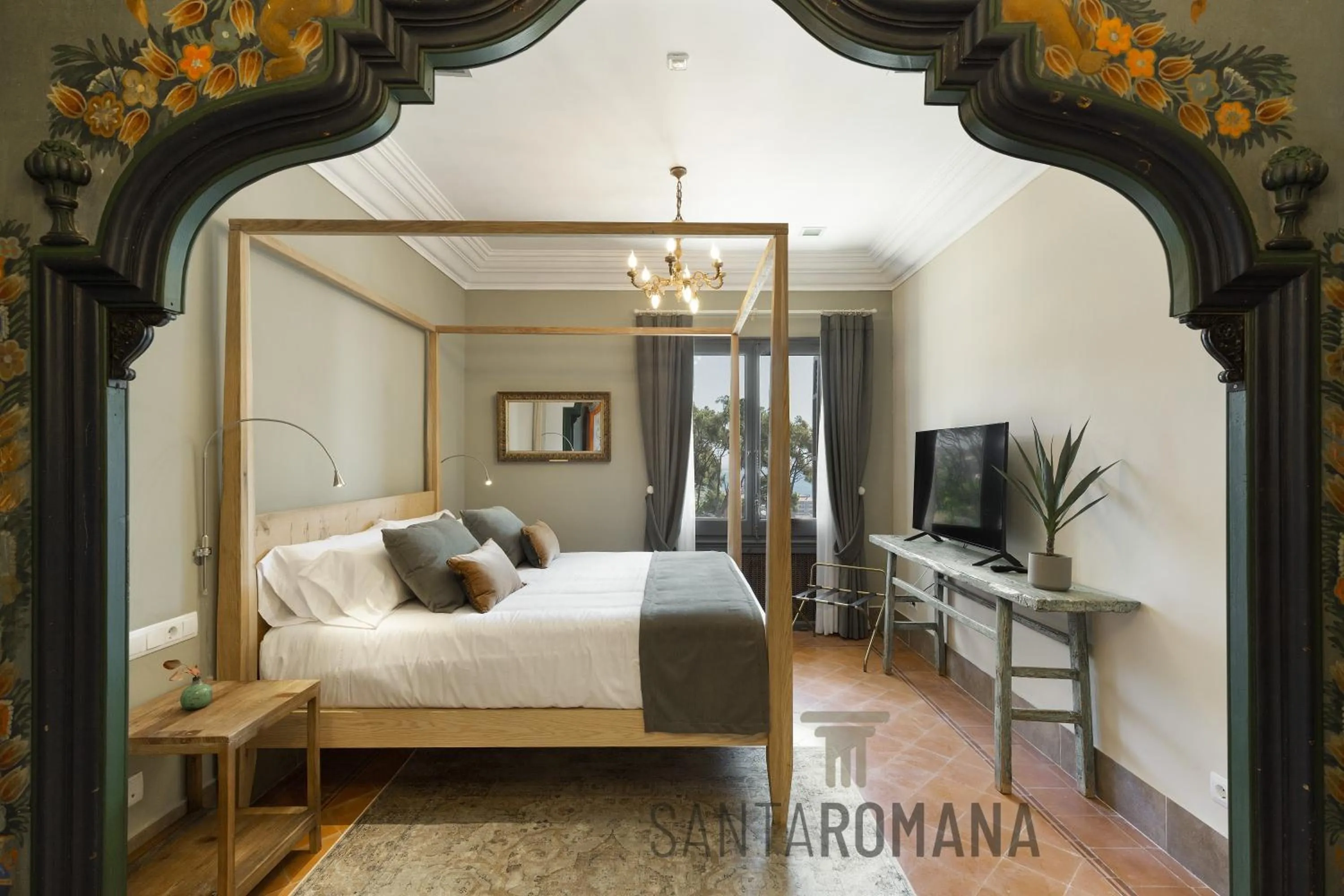 Bed in Santa Romana Apartments & Suites