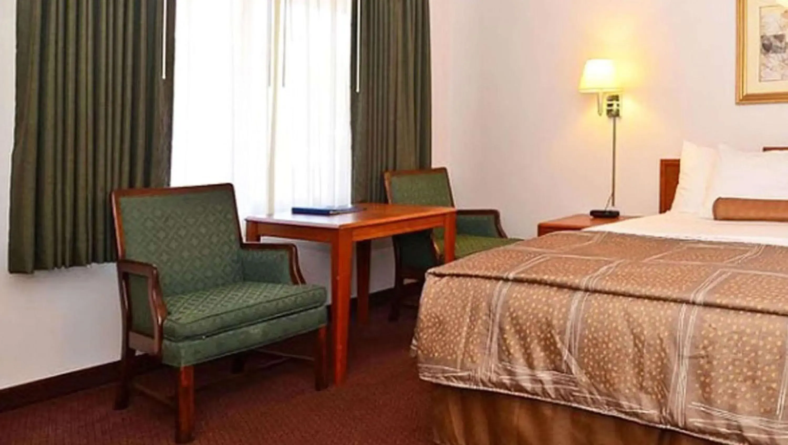 Photo of the whole room, Bed in Magnuson Hotel Manitou Springs Photo of the whole room, Bed in Magnuson Hotel Manitou Springs