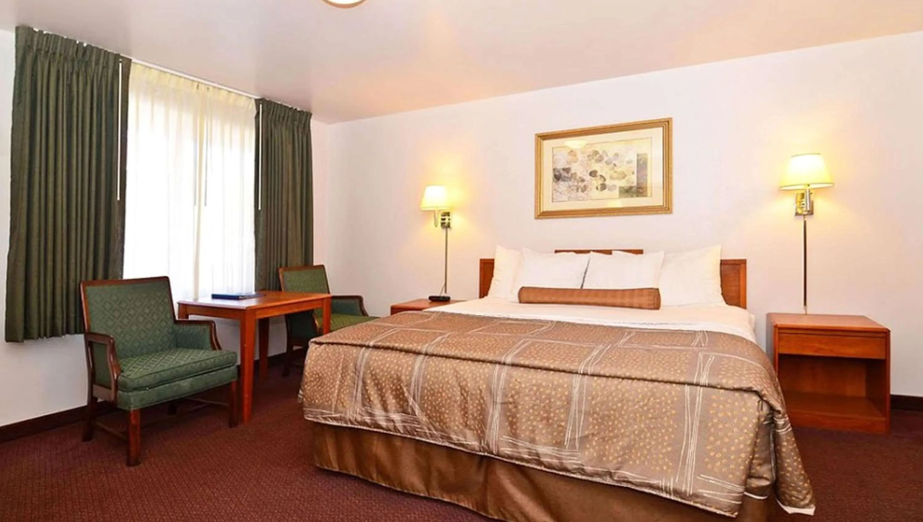 Photo of the whole room, Bed in Magnuson Hotel Manitou Springs