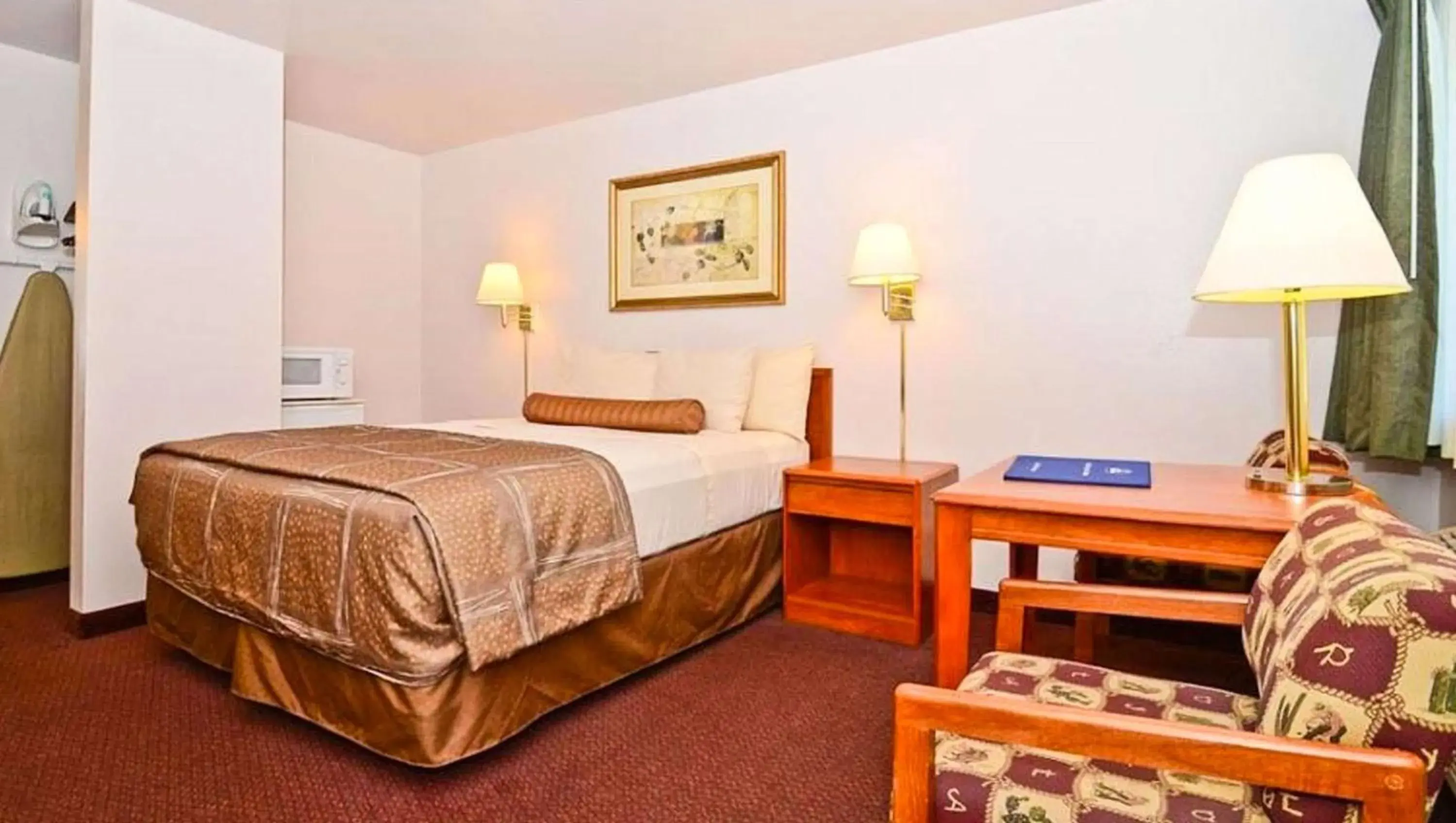 Photo of the whole room, Bed in Magnuson Hotel Manitou Springs Photo of the whole room, Bed in Magnuson Hotel Manitou Springs