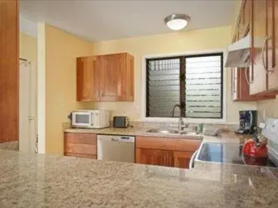 Kitchen/Kitchenette in Lae Nani Resort Kauai By Outrigger