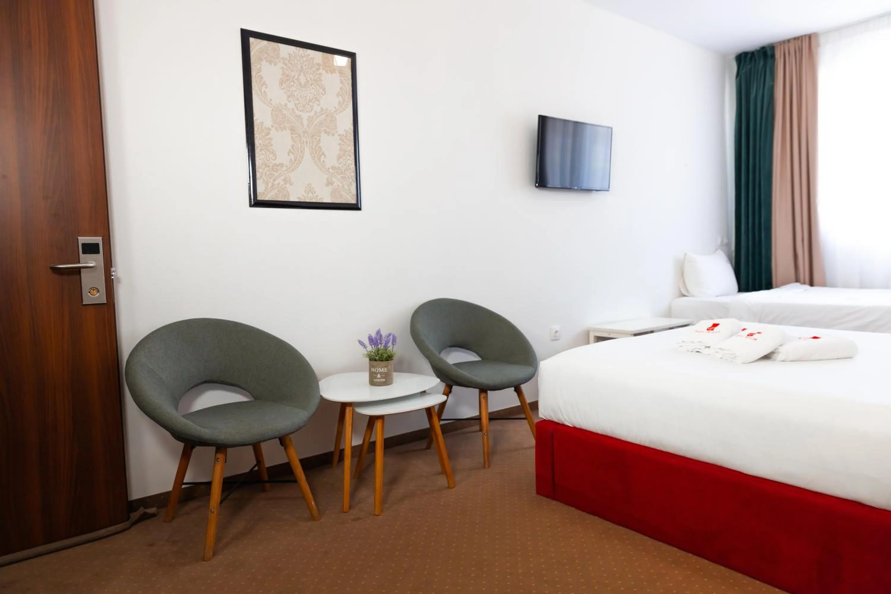 Bed in City Plaza Apartments & Rooms