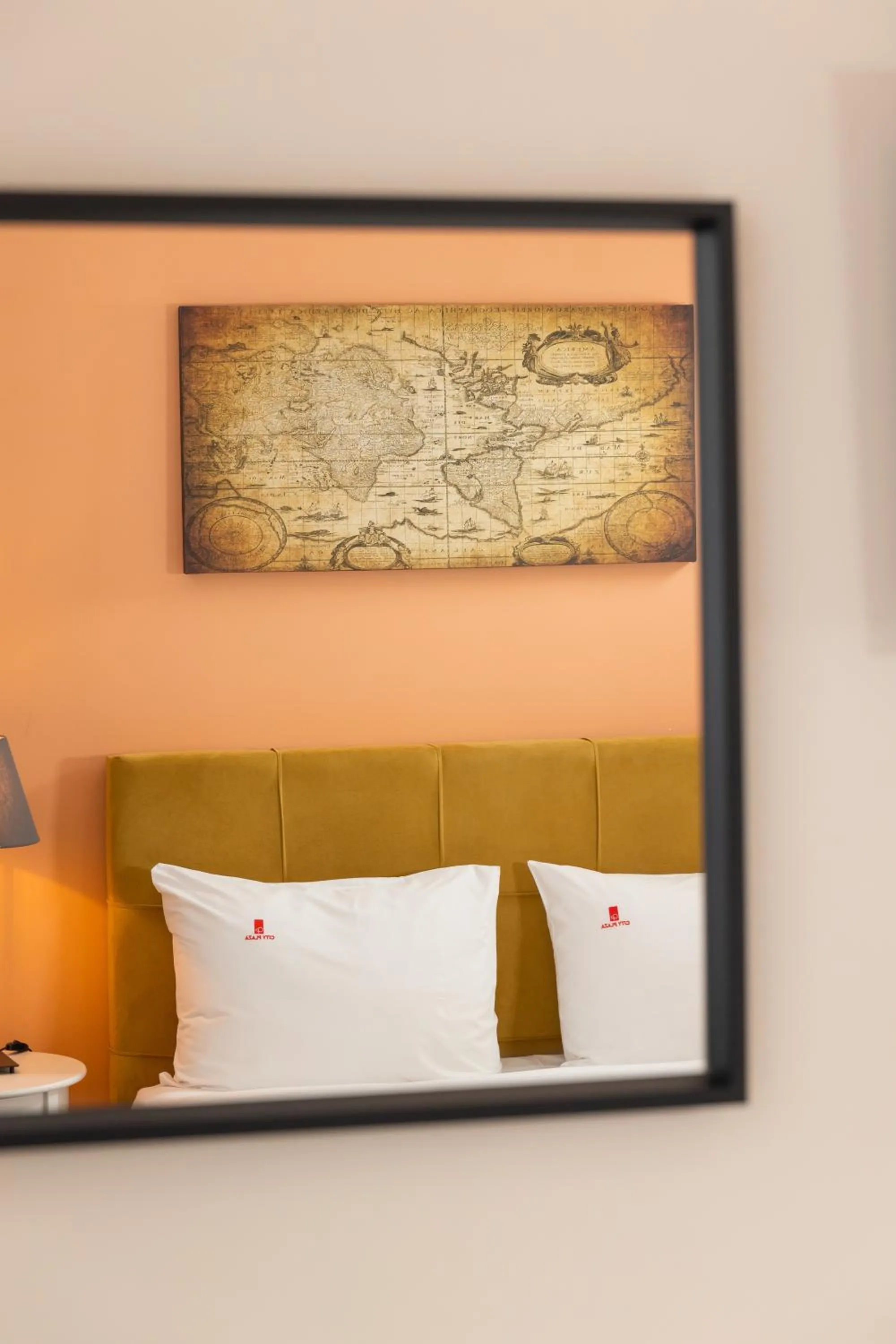 Bed in City Plaza Apartments & Rooms