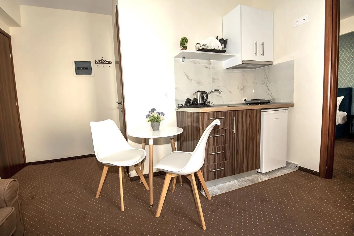 Kitchen or kitchenette in City Plaza Apartments & Rooms