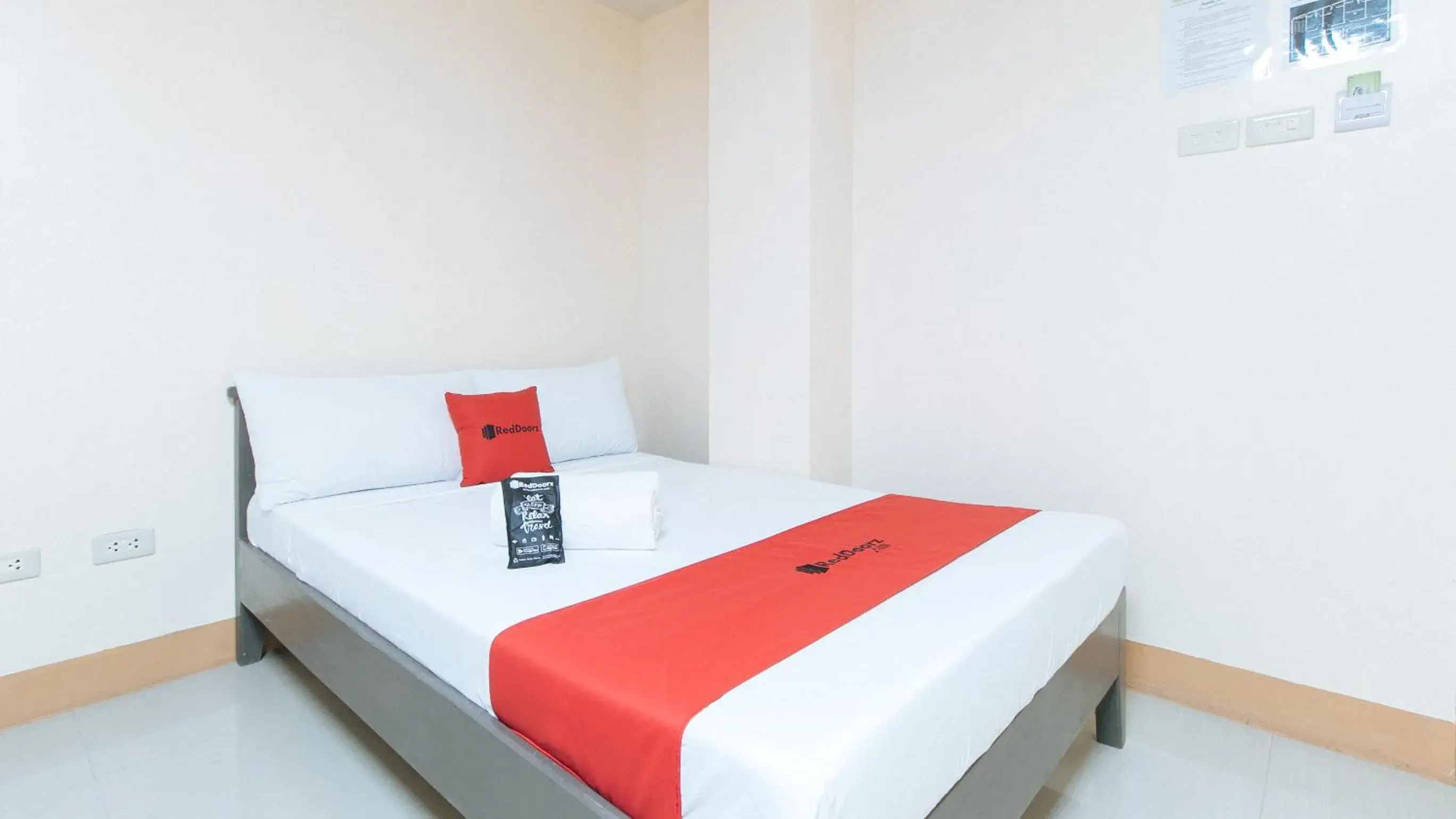 Bed in RedDoorz at Isabelita Hotel Tuguegarao City Bed in RedDoorz at Isabelita Hotel Tuguegarao City