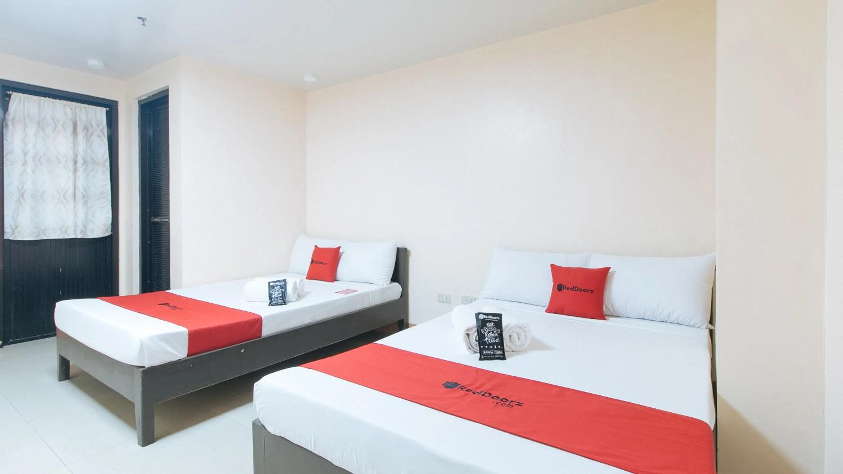 Bed in RedDoorz at Isabelita Hotel Tuguegarao City