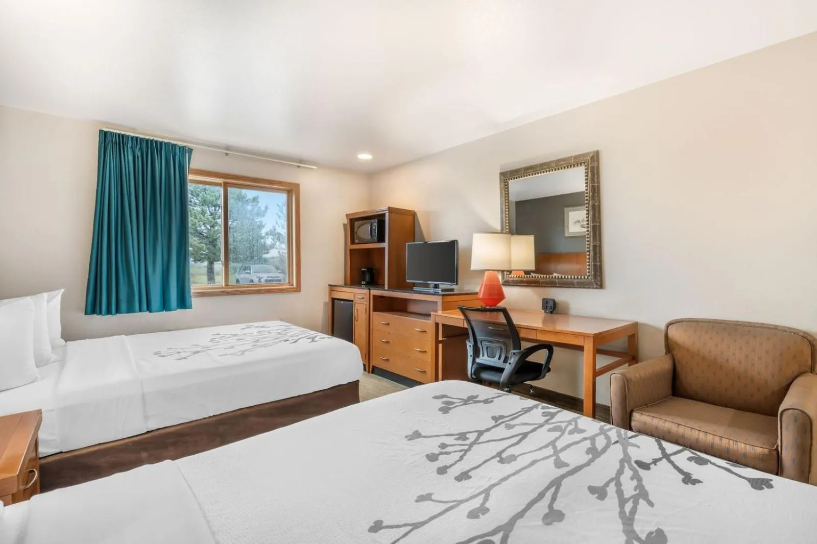 Bed in Colstrip Inn & Suites