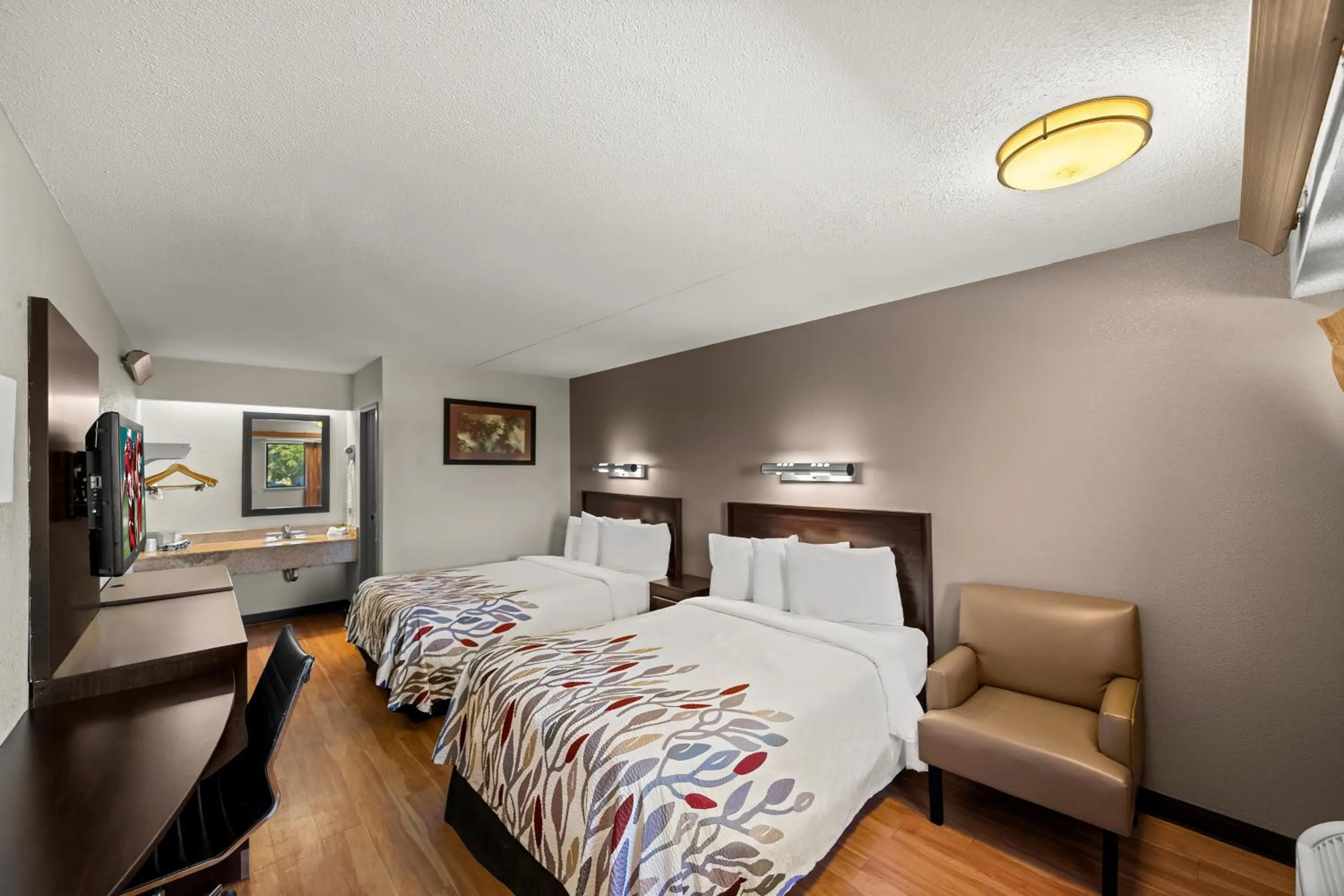 Bed in Red Roof Inn Dallas - DFW Airport North