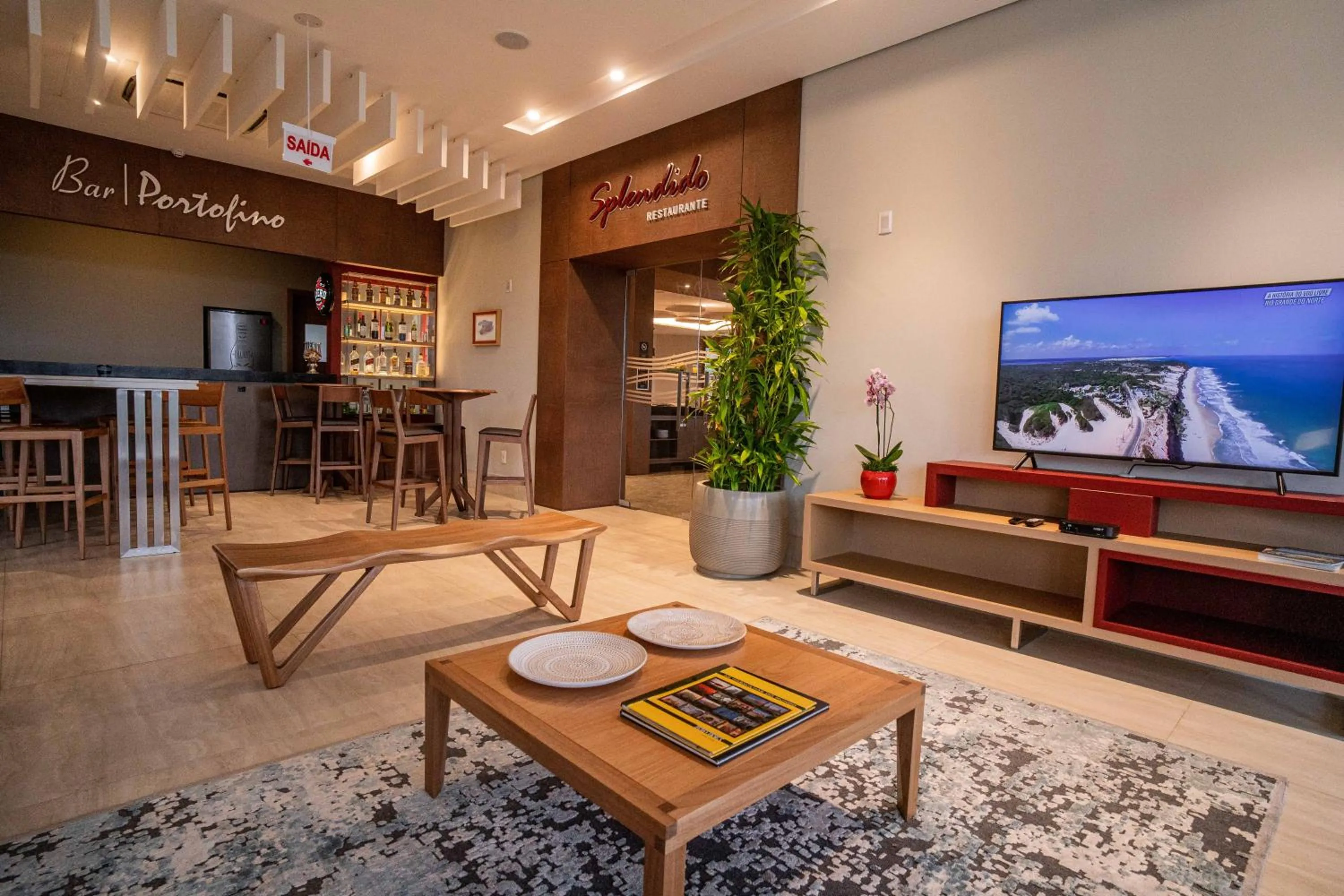 Communal lounge/ TV room in Intercity Portofino Florianópolis