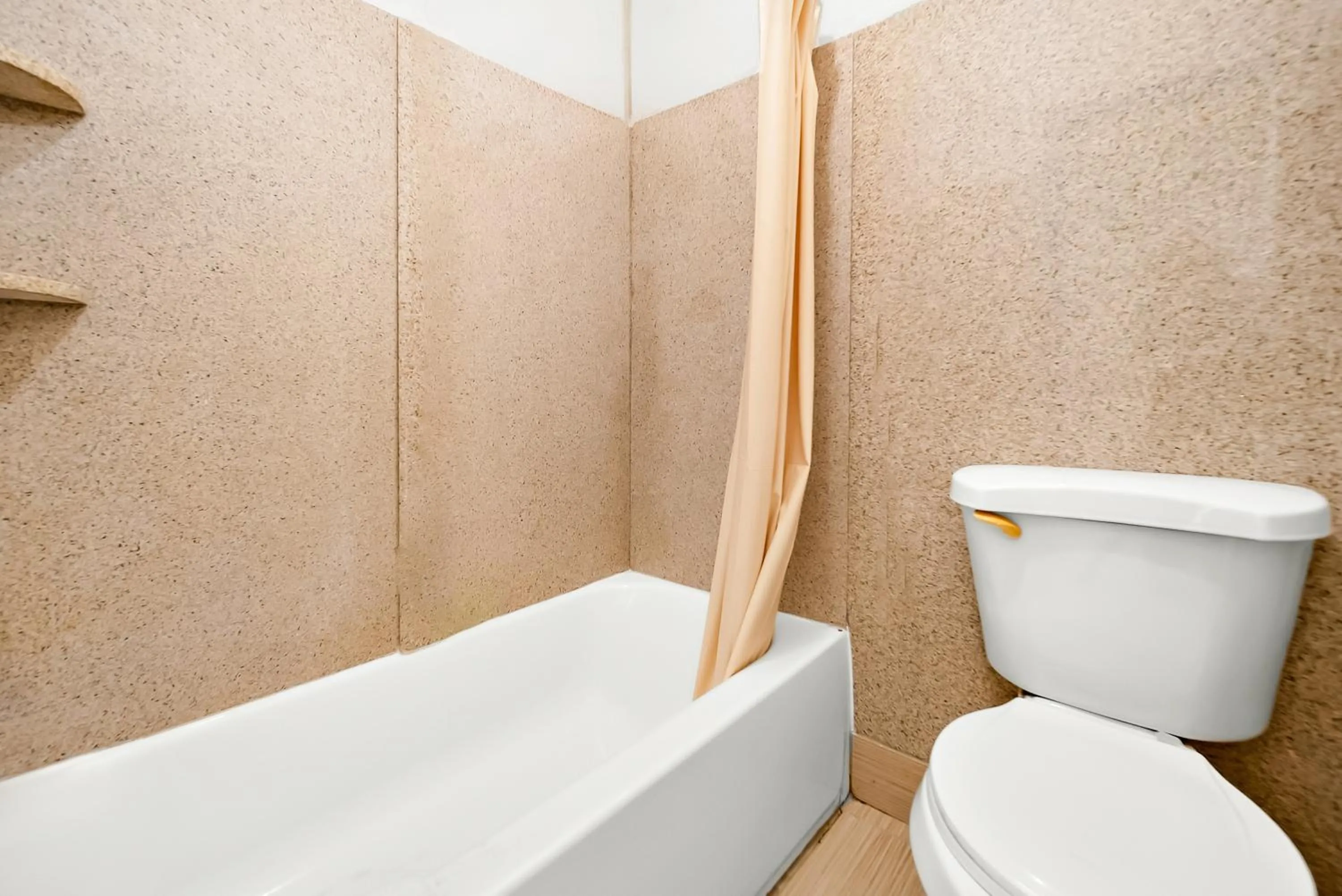 Toilet in Capitol Inn and Suites