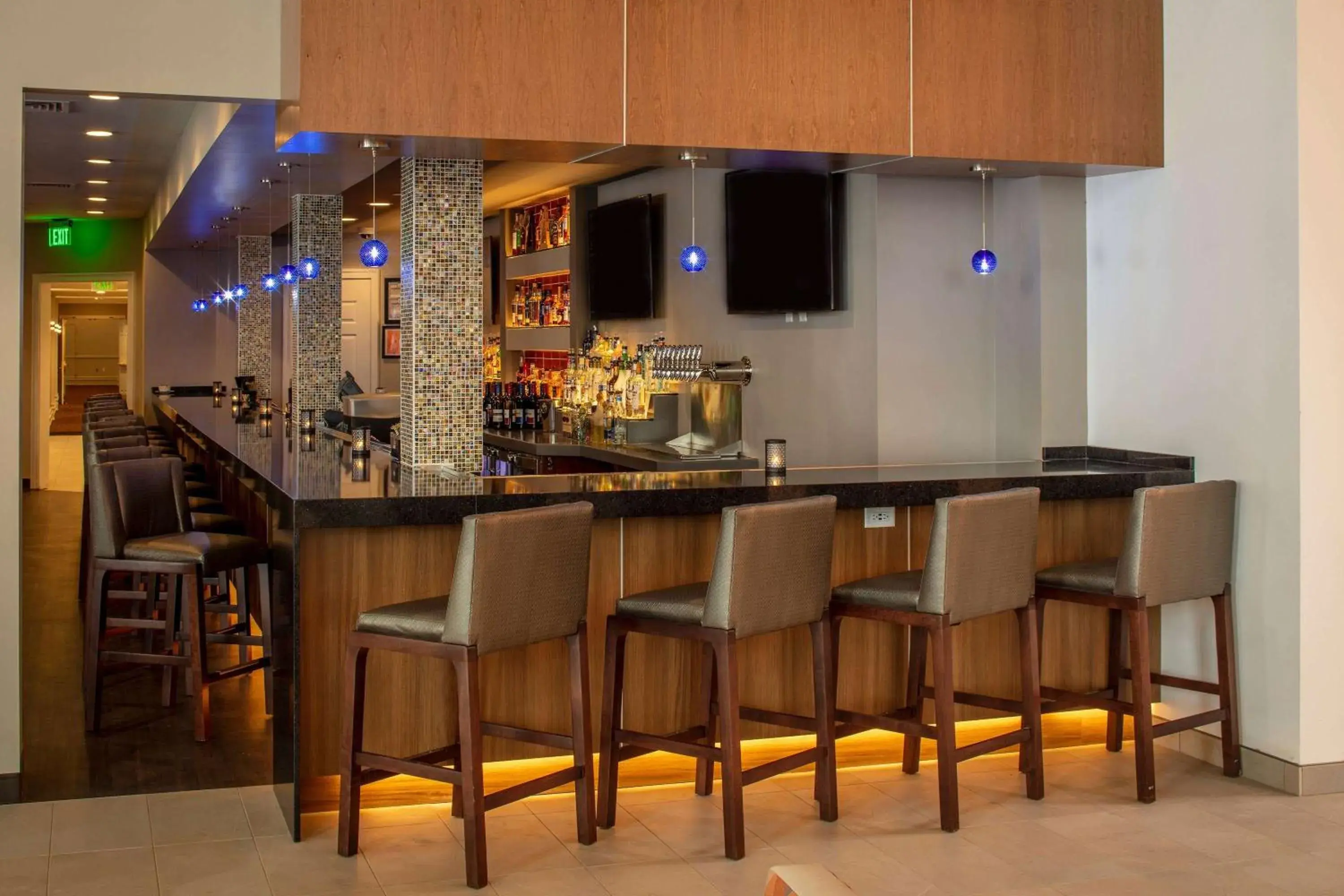 Lounge or bar in Collegian Hotel & Suites, Trademark Collection by Wyndham Lounge or bar in Collegian Hotel & Suites, Trademark Collection by Wyndham