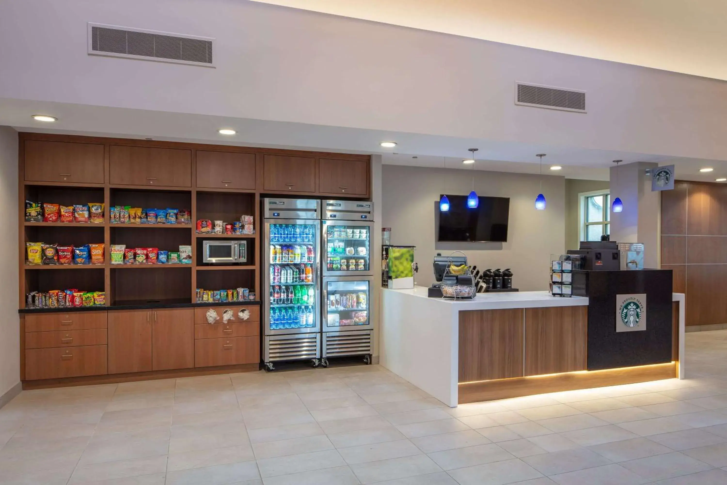 Lobby or reception in Collegian Hotel & Suites, Trademark Collection by Wyndham Lobby or reception in Collegian Hotel & Suites, Trademark Collection by Wyndham