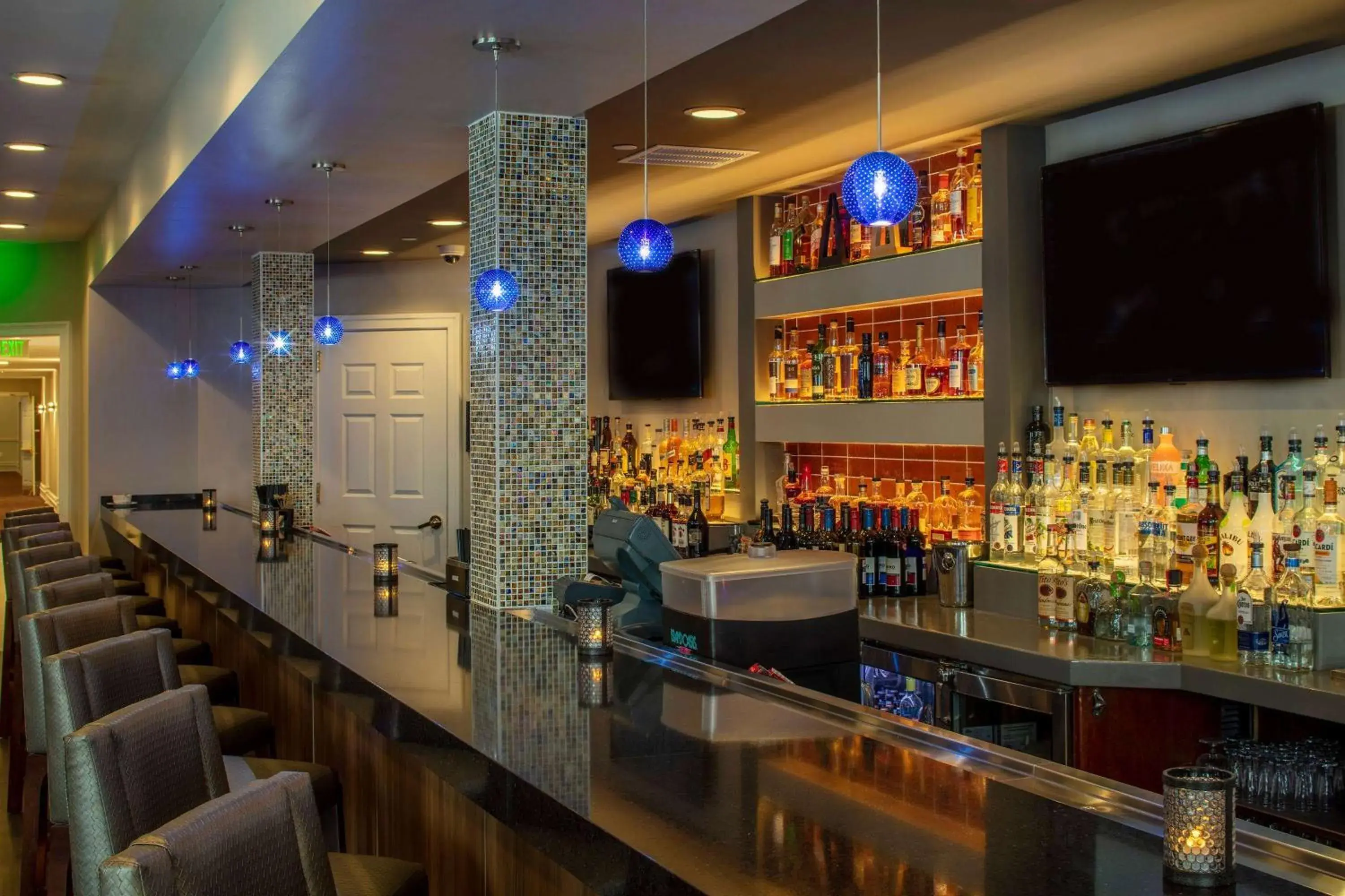 Lounge or bar in Collegian Hotel & Suites, Trademark Collection by Wyndham Lounge or bar in Collegian Hotel & Suites, Trademark Collection by Wyndham