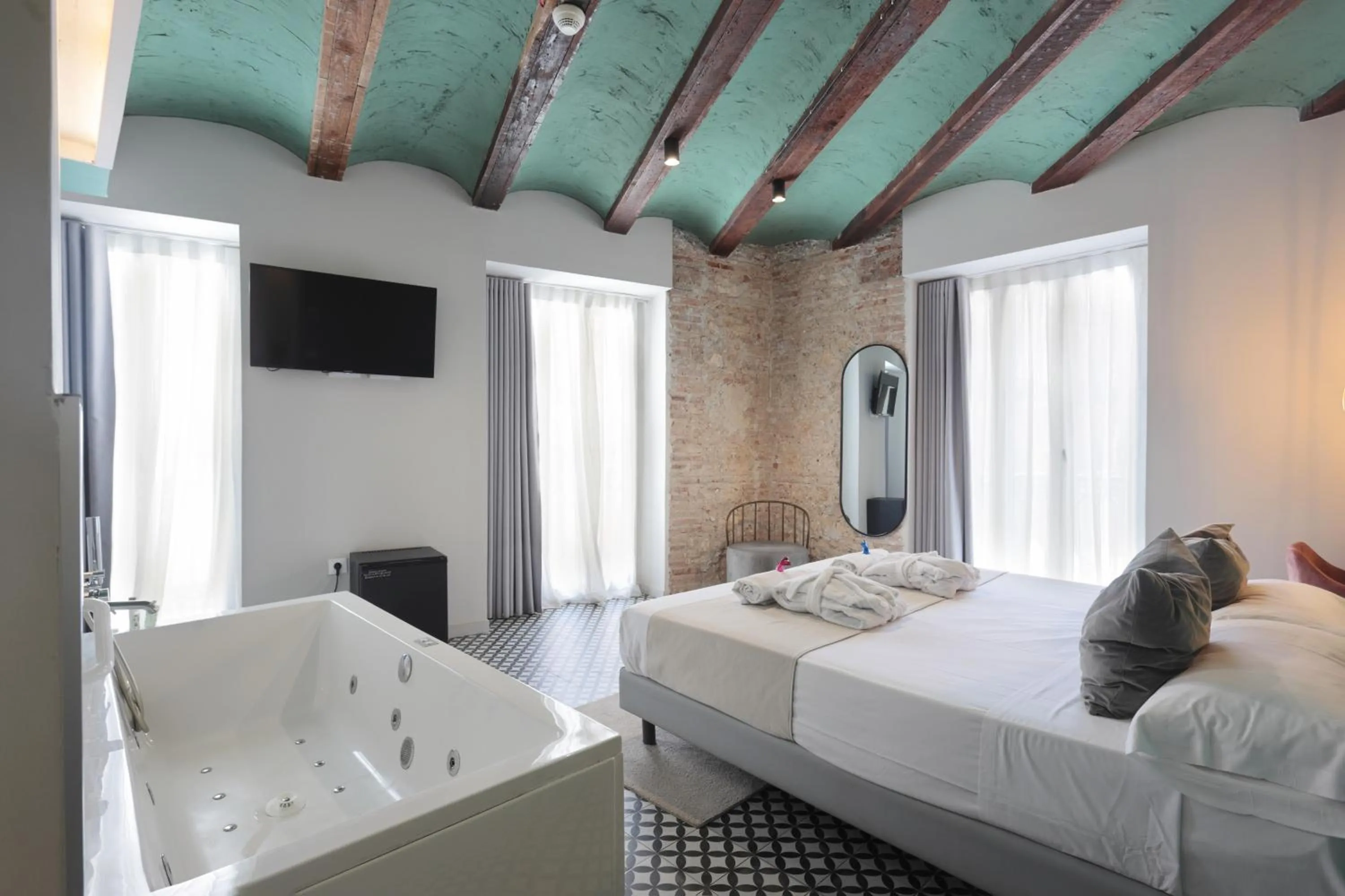 Bed in YOU & CO. Quart Boutique