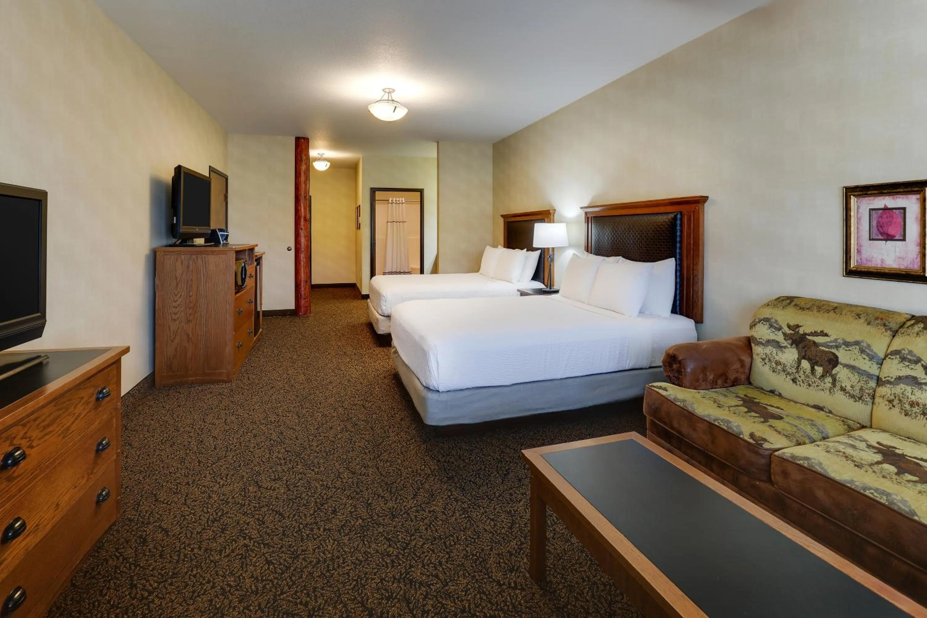 Bed in Stoney Creek Hotel Sioux City