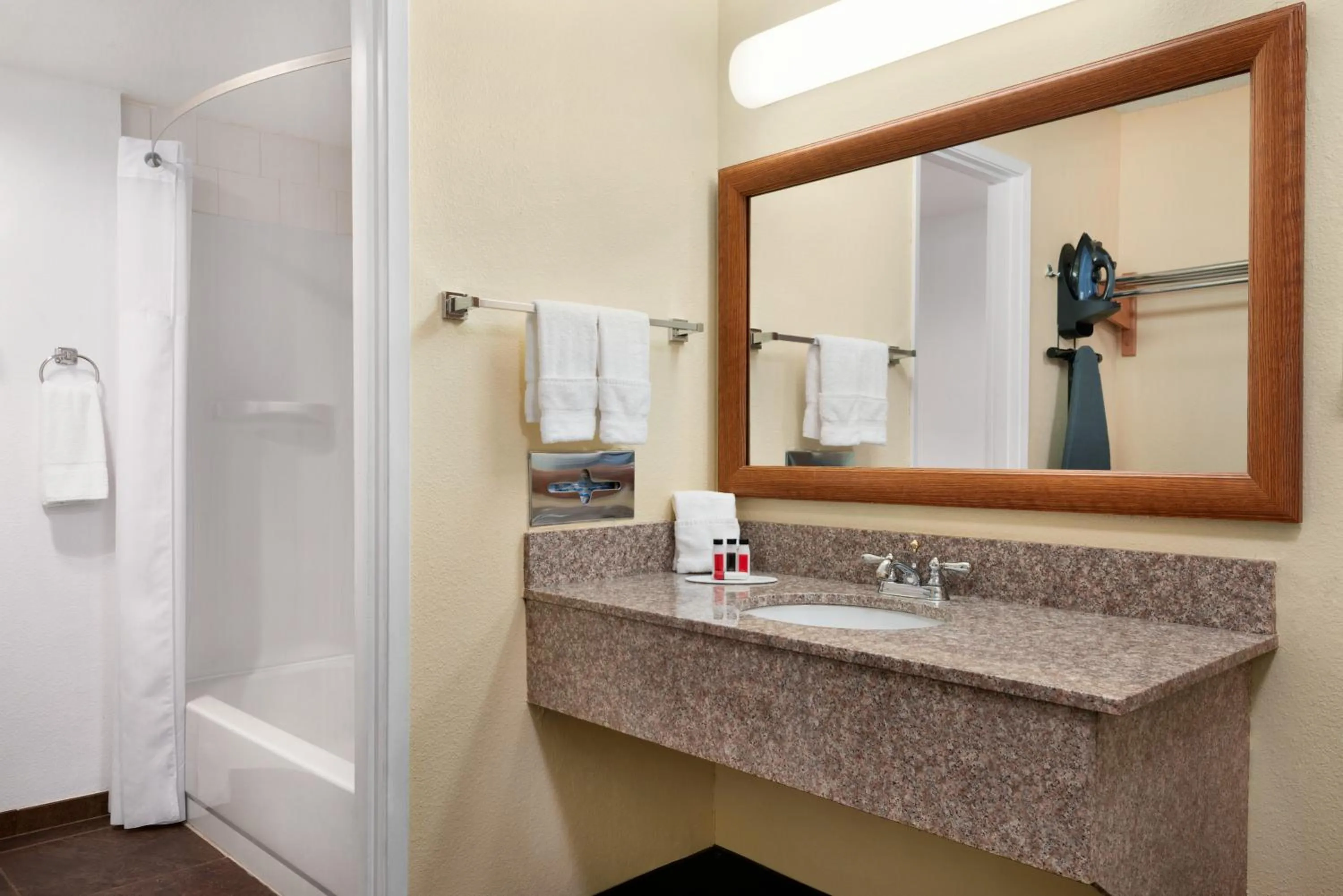 Shower in Ramada by Wyndham Spokane Airport