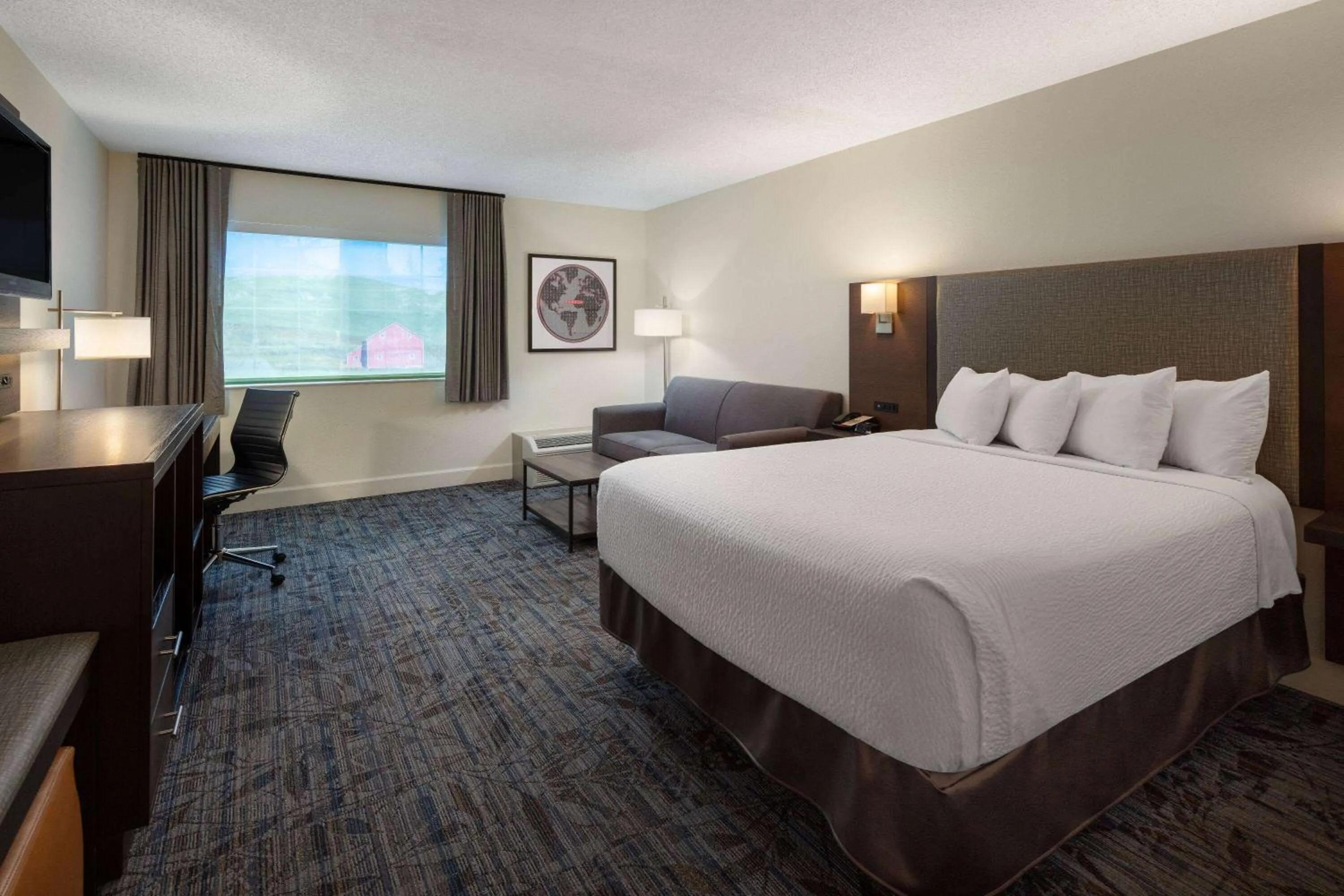 Photo of the whole room, Bed in Ramada by Wyndham Spokane Airport