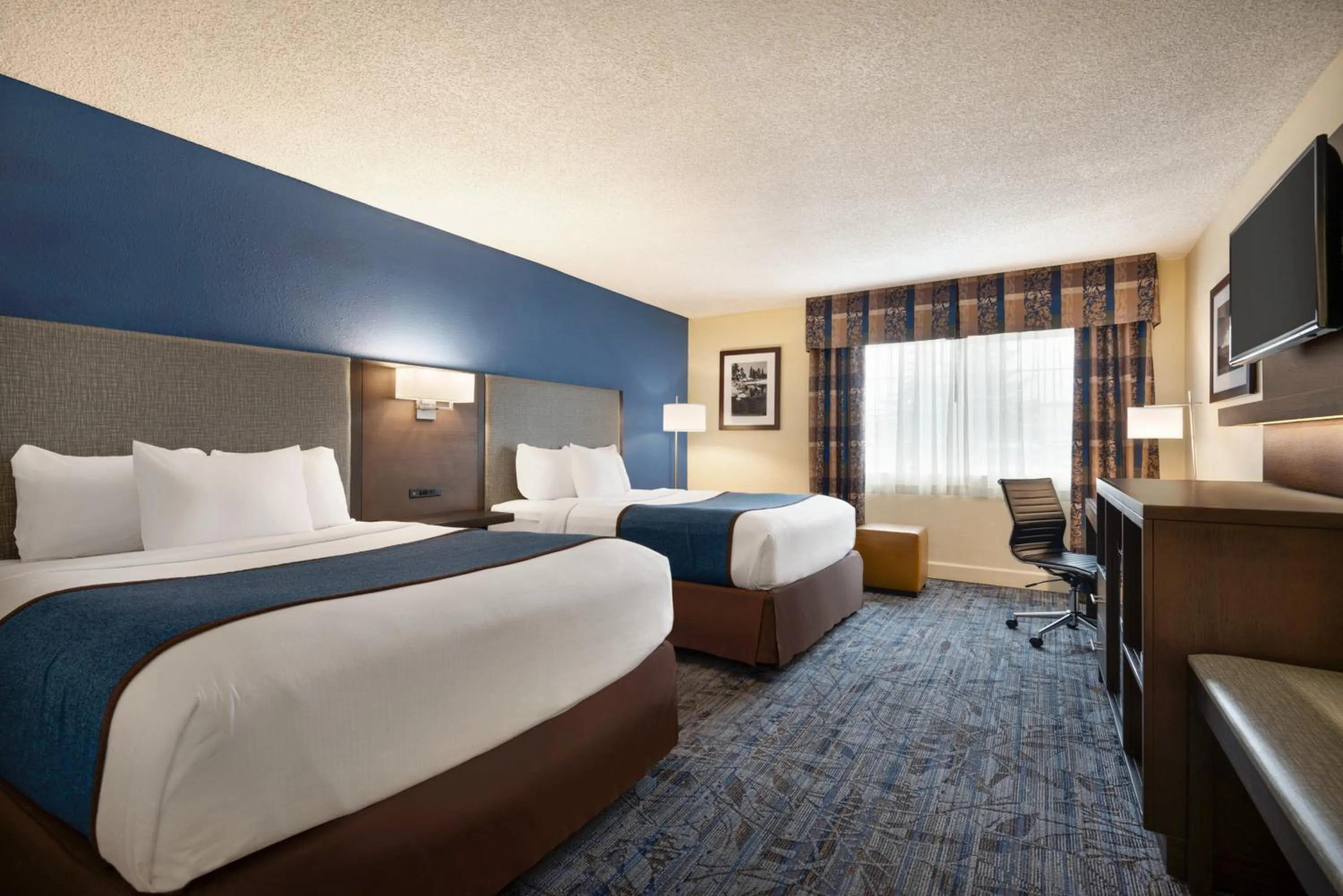 Bed in Ramada by Wyndham Spokane Airport
