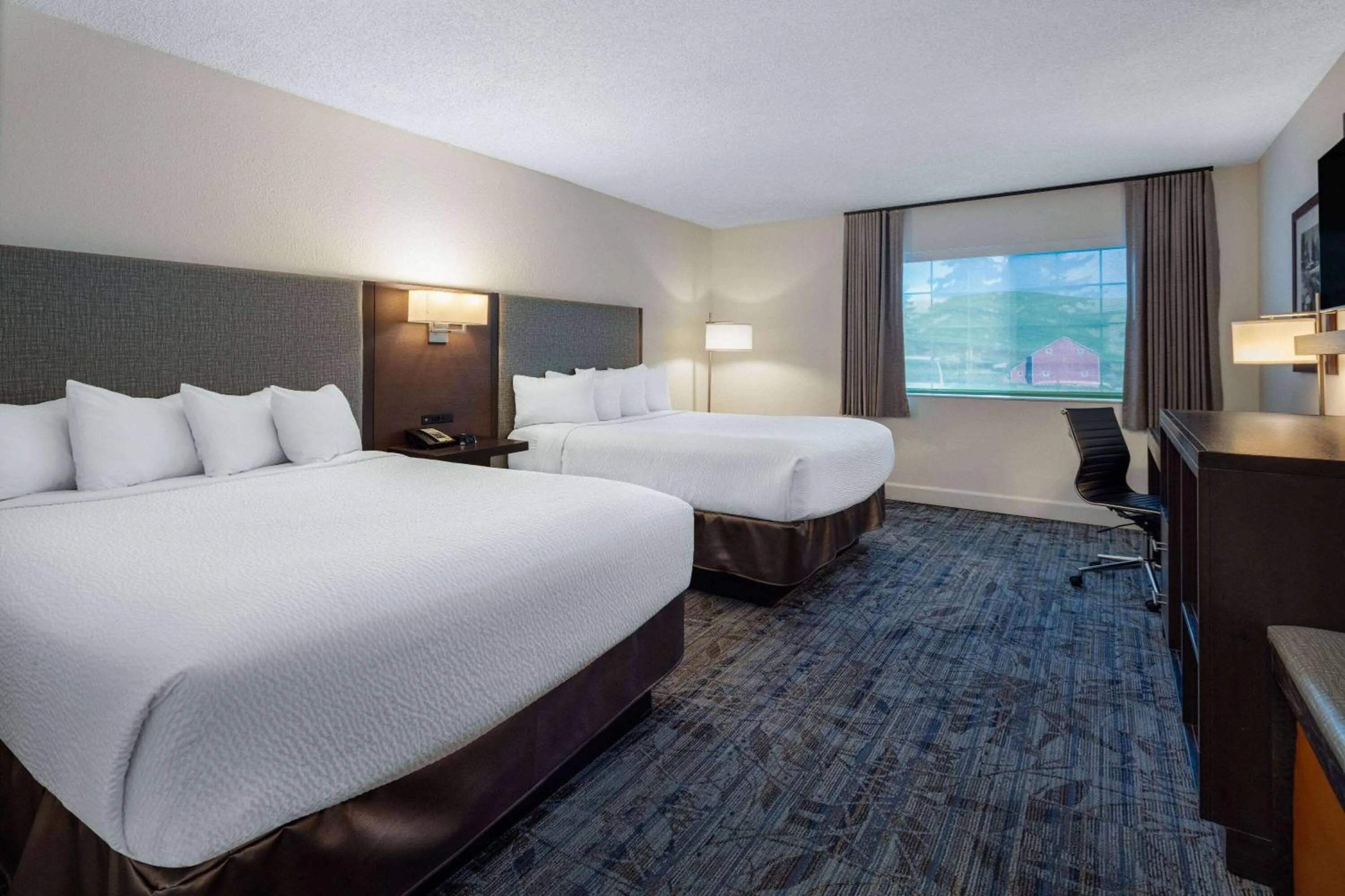 Photo of the whole room, Bed in Ramada by Wyndham Spokane Airport