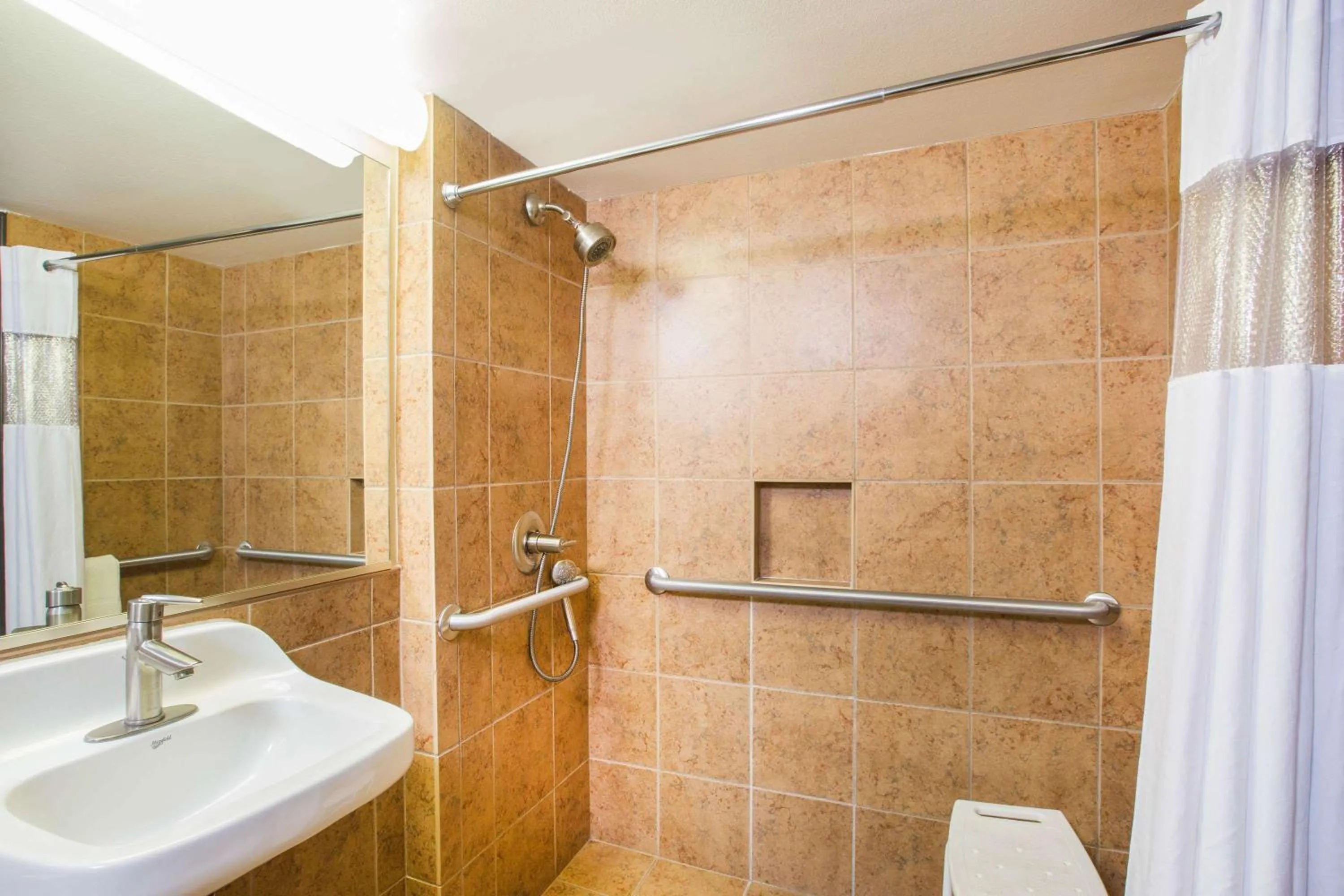 Photo of the whole room in Ramada by Wyndham Des Moines Tropics Resort & Conference Ctr