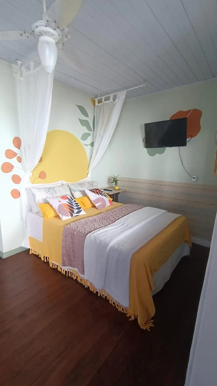 Bed in Pousada Vida Simples