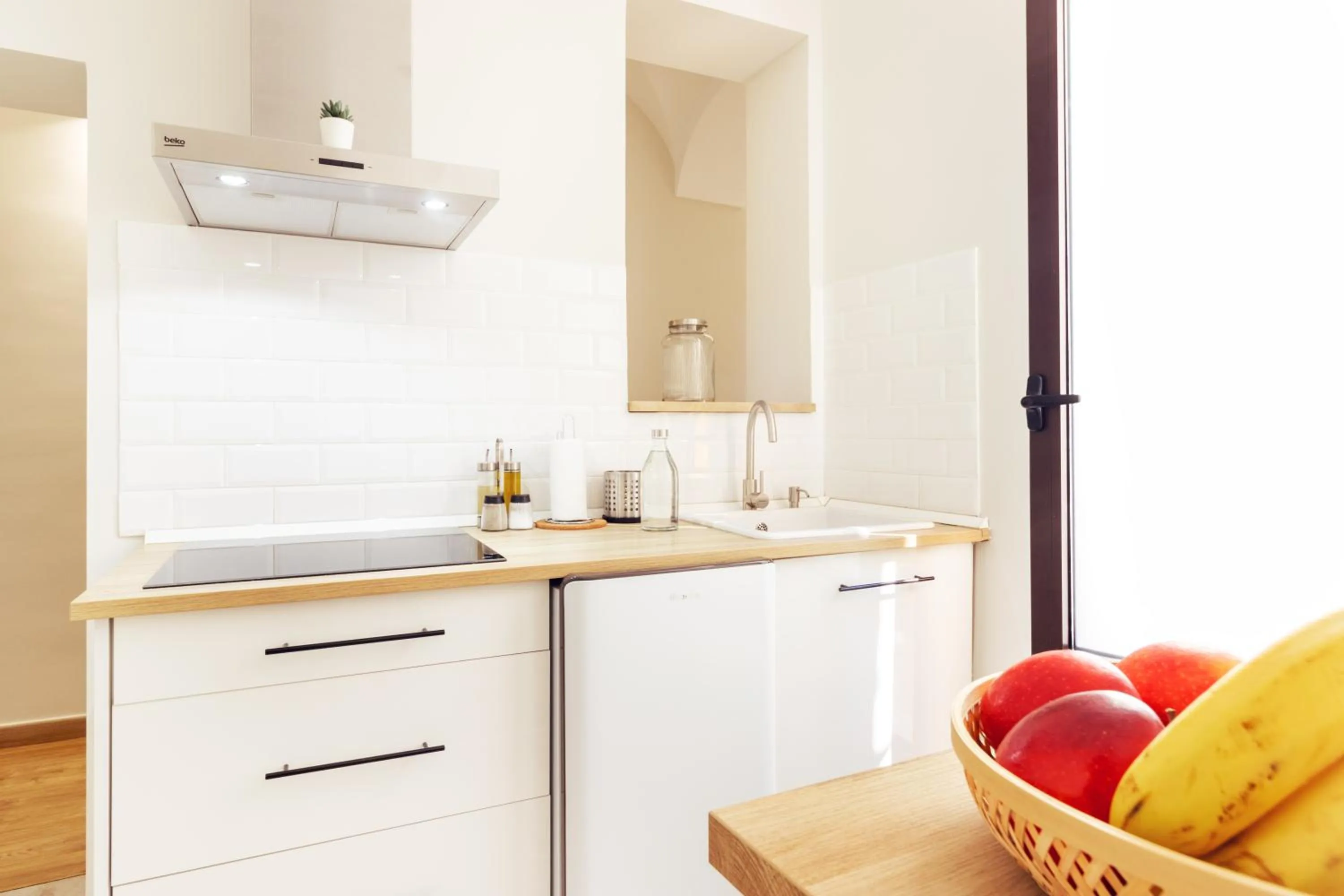 Kitchen or kitchenette in Apartamentos Plaza Mayor 35