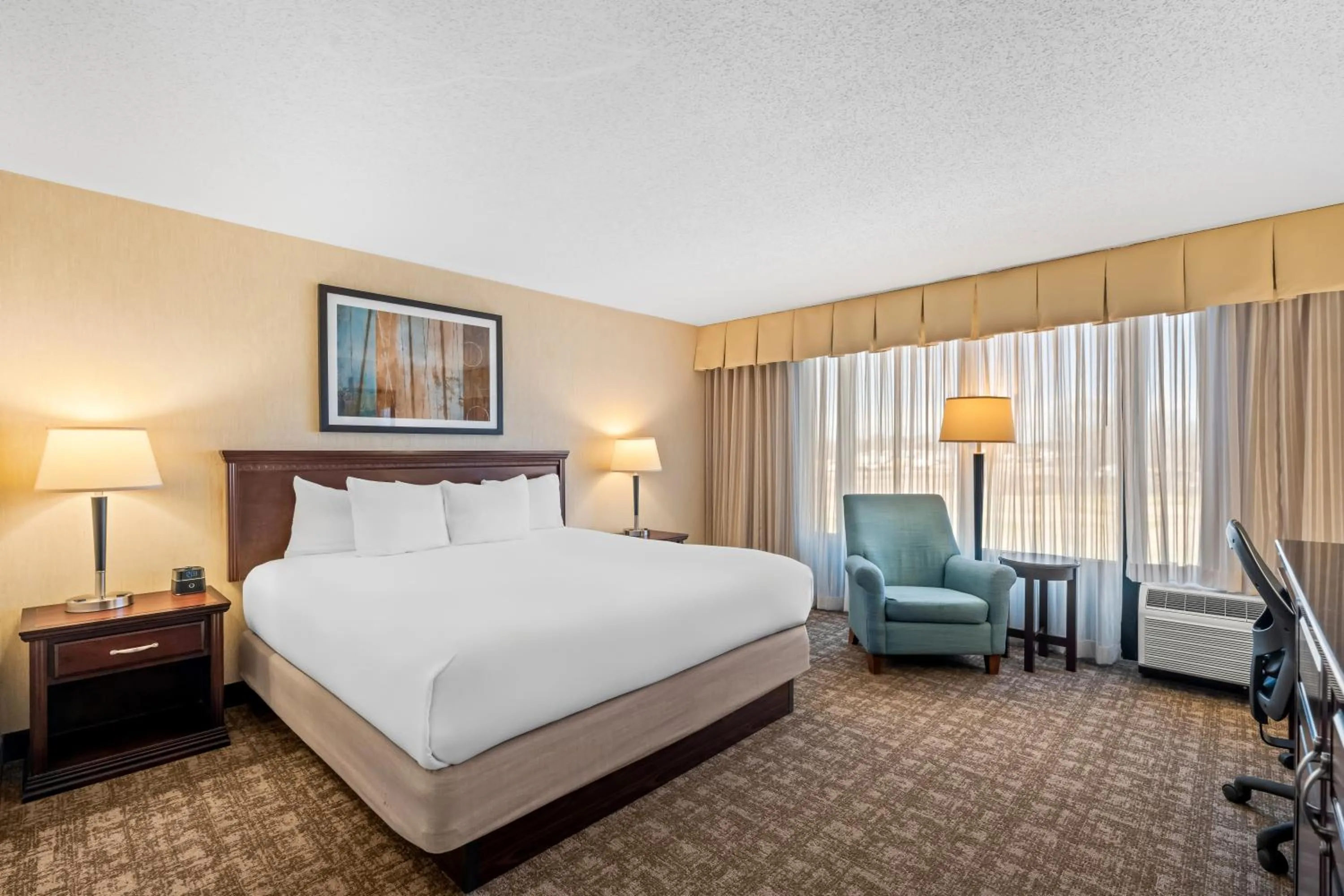 Bed in Prado Hotel by Choice Hotels