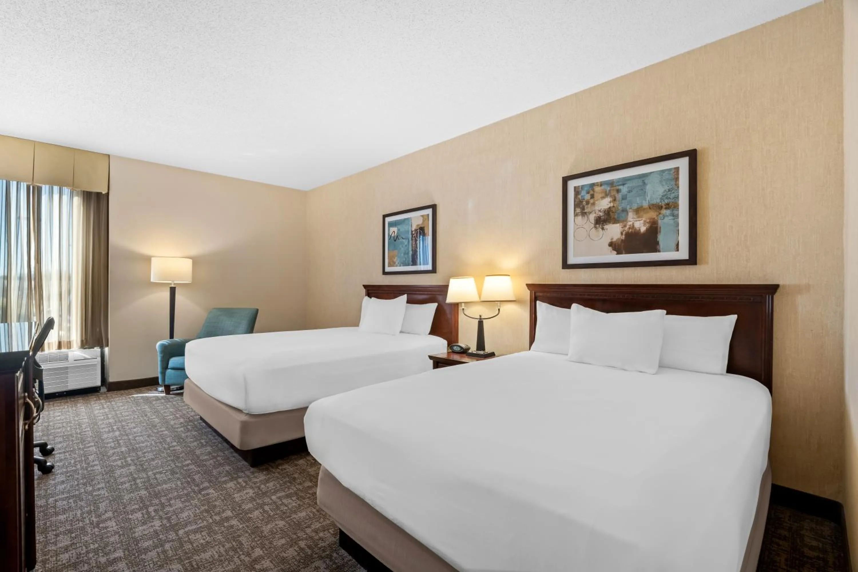 Bed in Prado Hotel by Choice Hotels