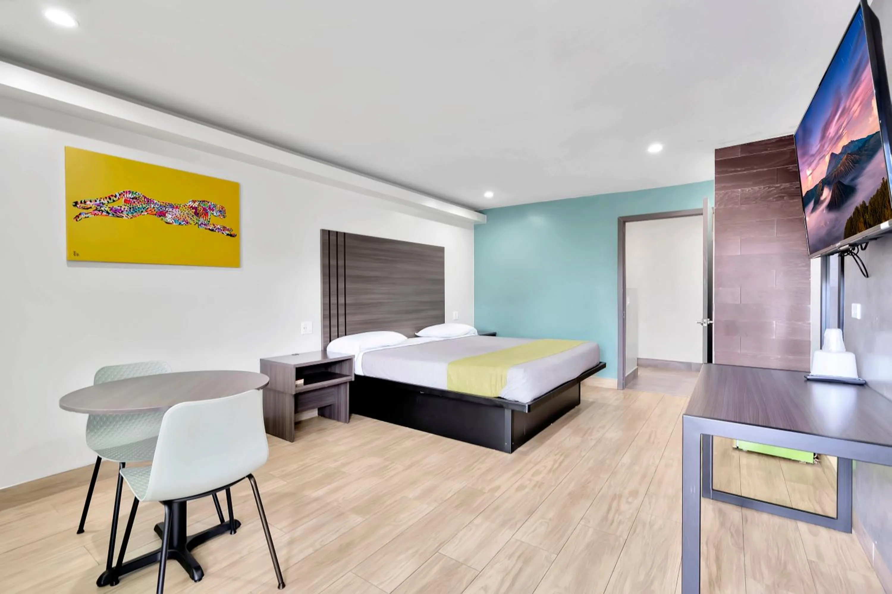 Bed in Exclusivo Inn and Suites