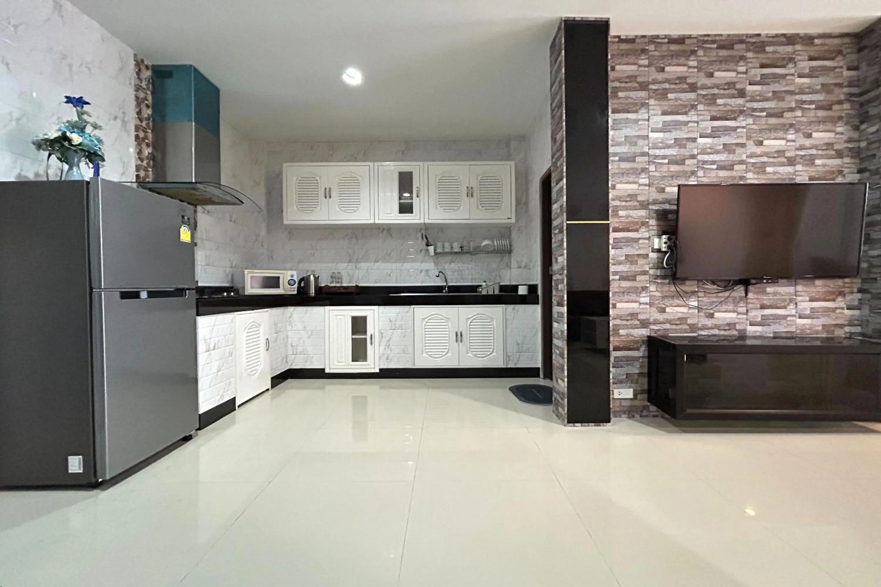 Kitchen or kitchenette in Nice Villa Resort Hat Yai