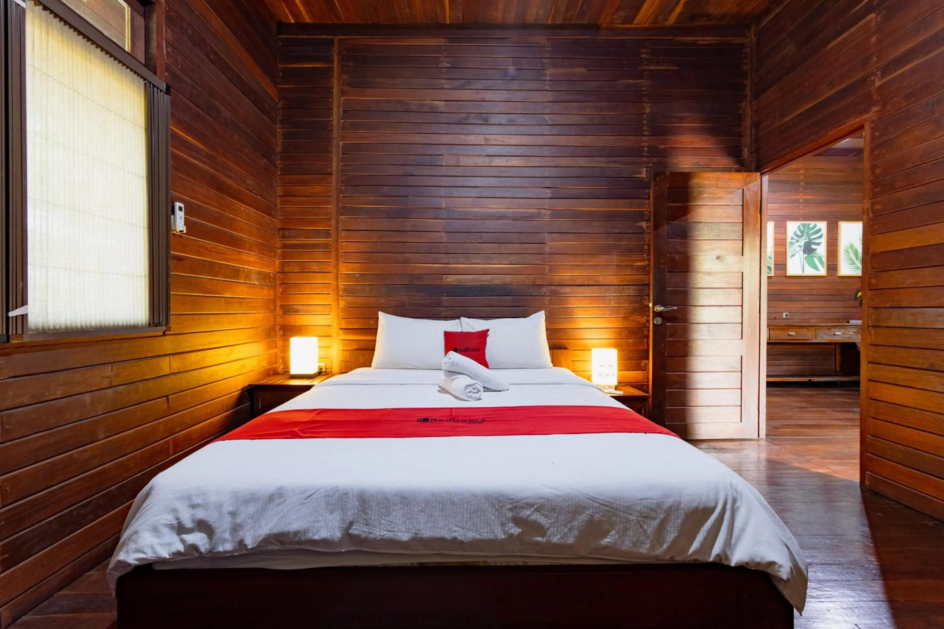Bedroom, Bed in RedDoorz Resort @ Taman Wisata Mangrove