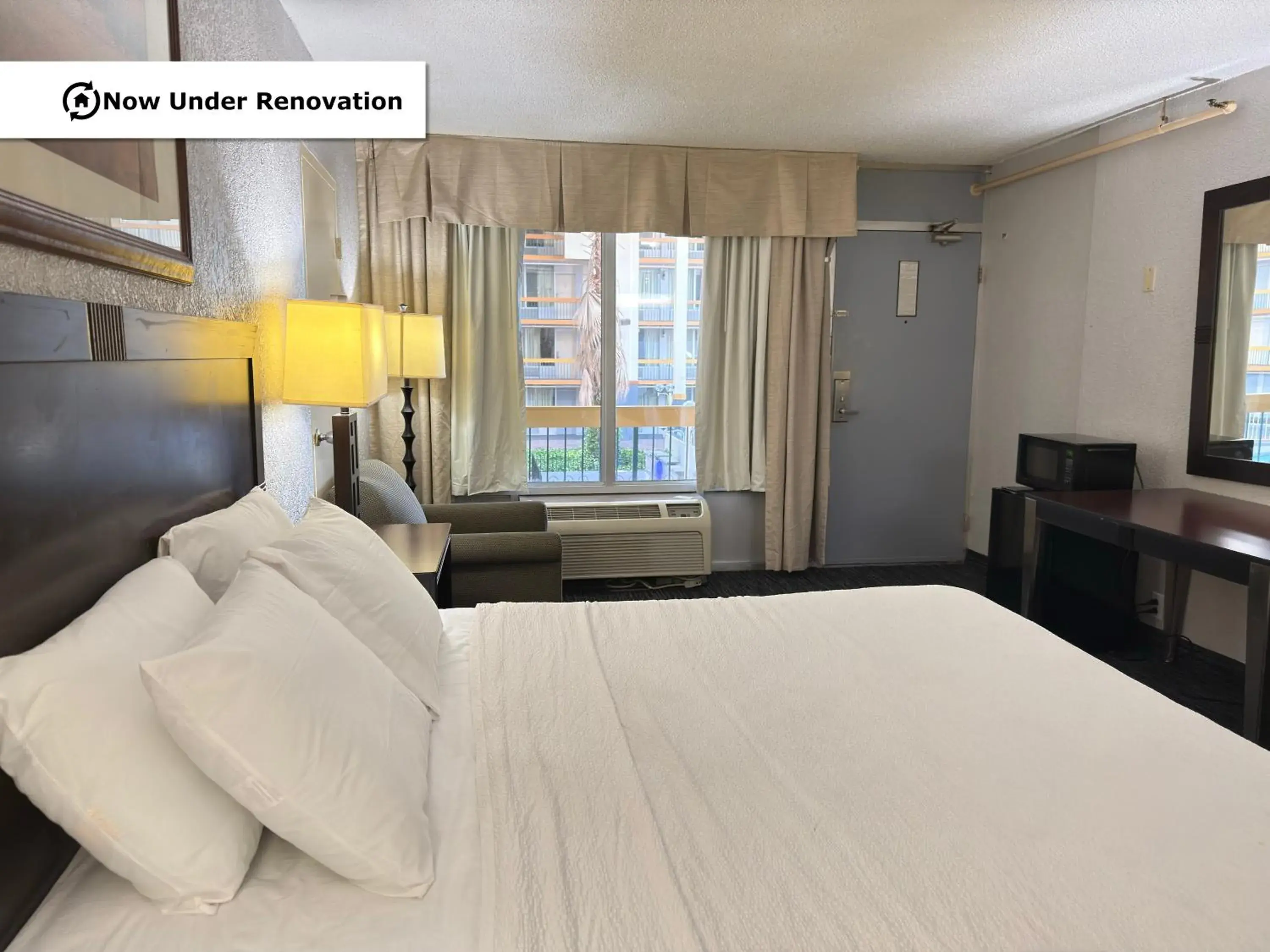 Bed in The Lodge Hotel and Banquets Bed in The Lodge Hotel and Banquets