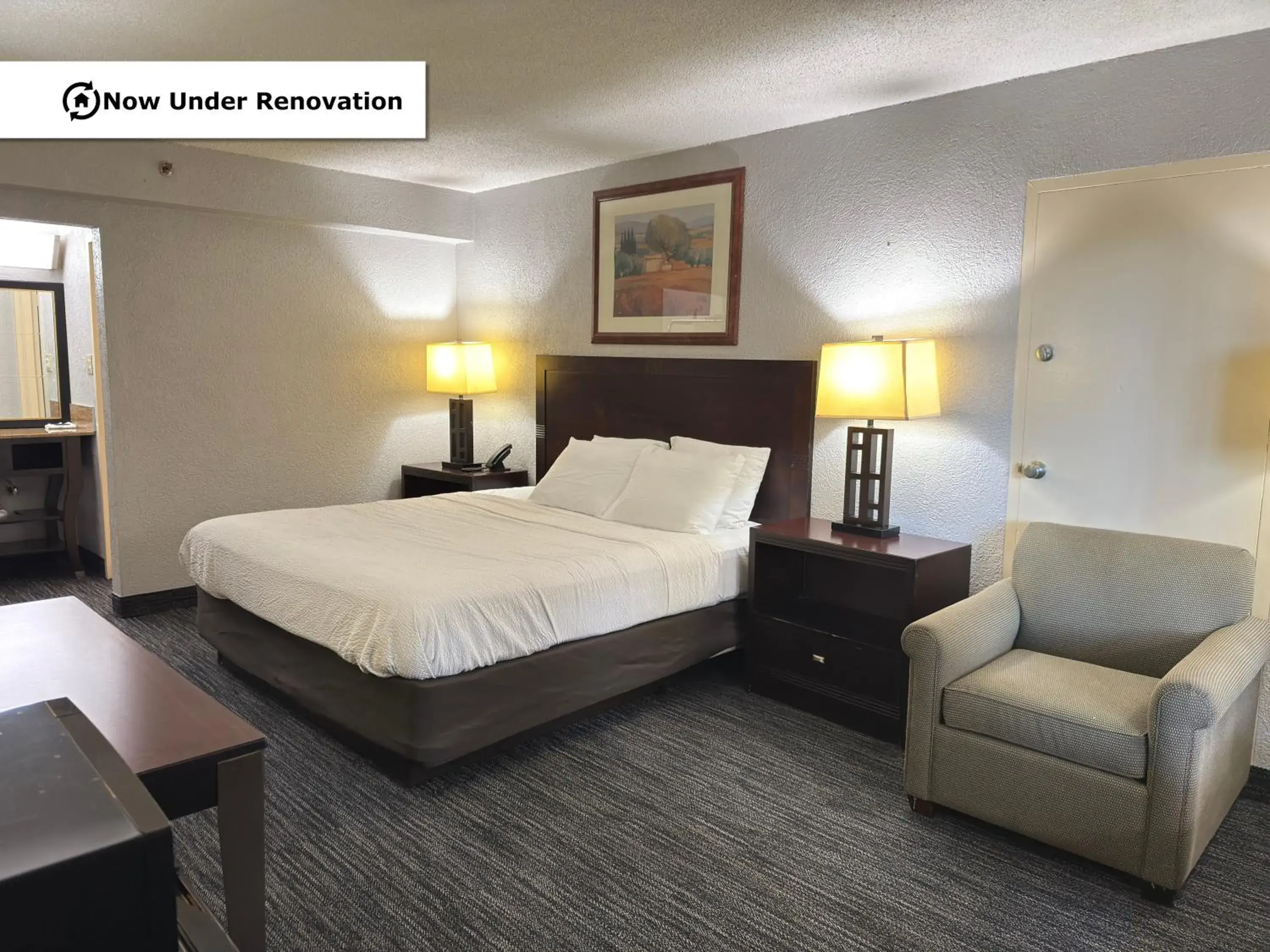 Bed in The Lodge Hotel and Banquets Bed in The Lodge Hotel and Banquets