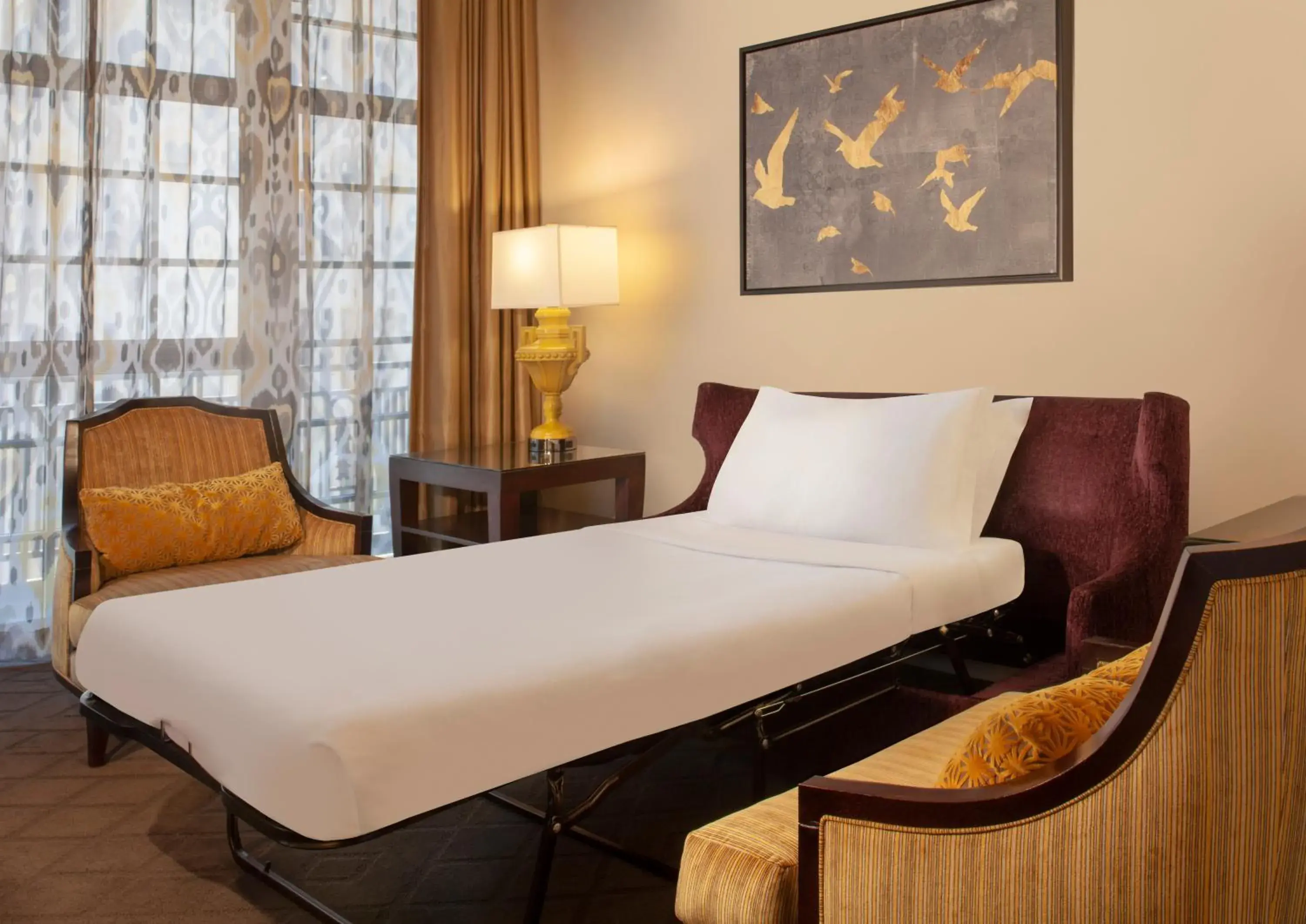 Seating area, Bed in The Ashton Hotel Seating area, Bed in The Ashton Hotel