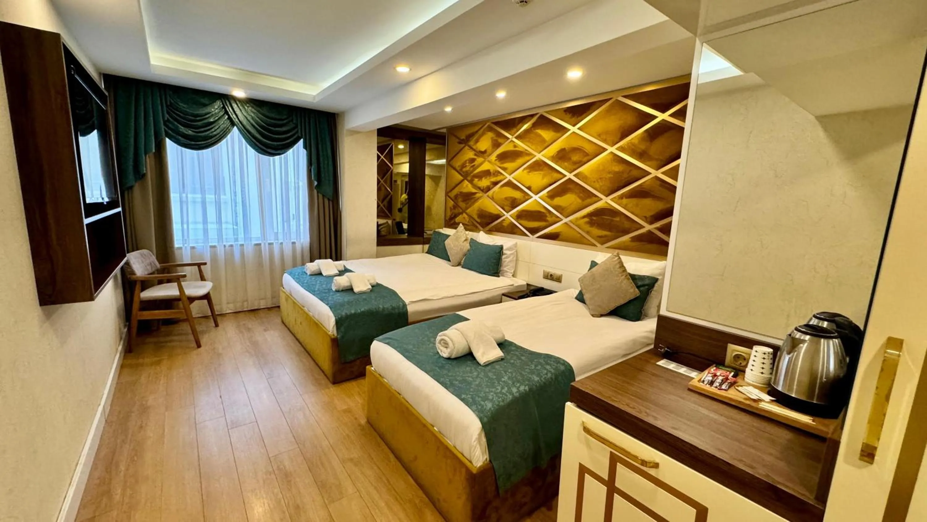 Photo of the whole room, Bed in Burj Al Istanbul