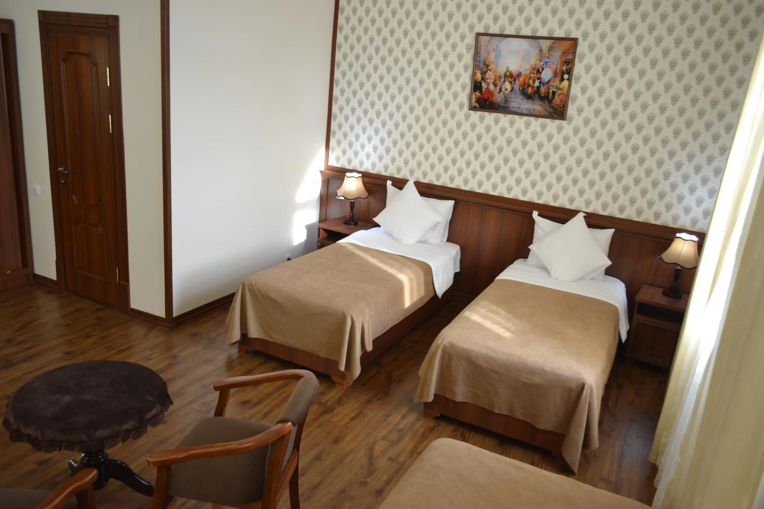 Bed in Erkin Palace Hotel