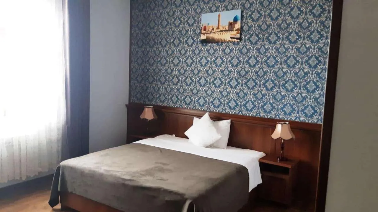 Bed in Erkin Palace Hotel