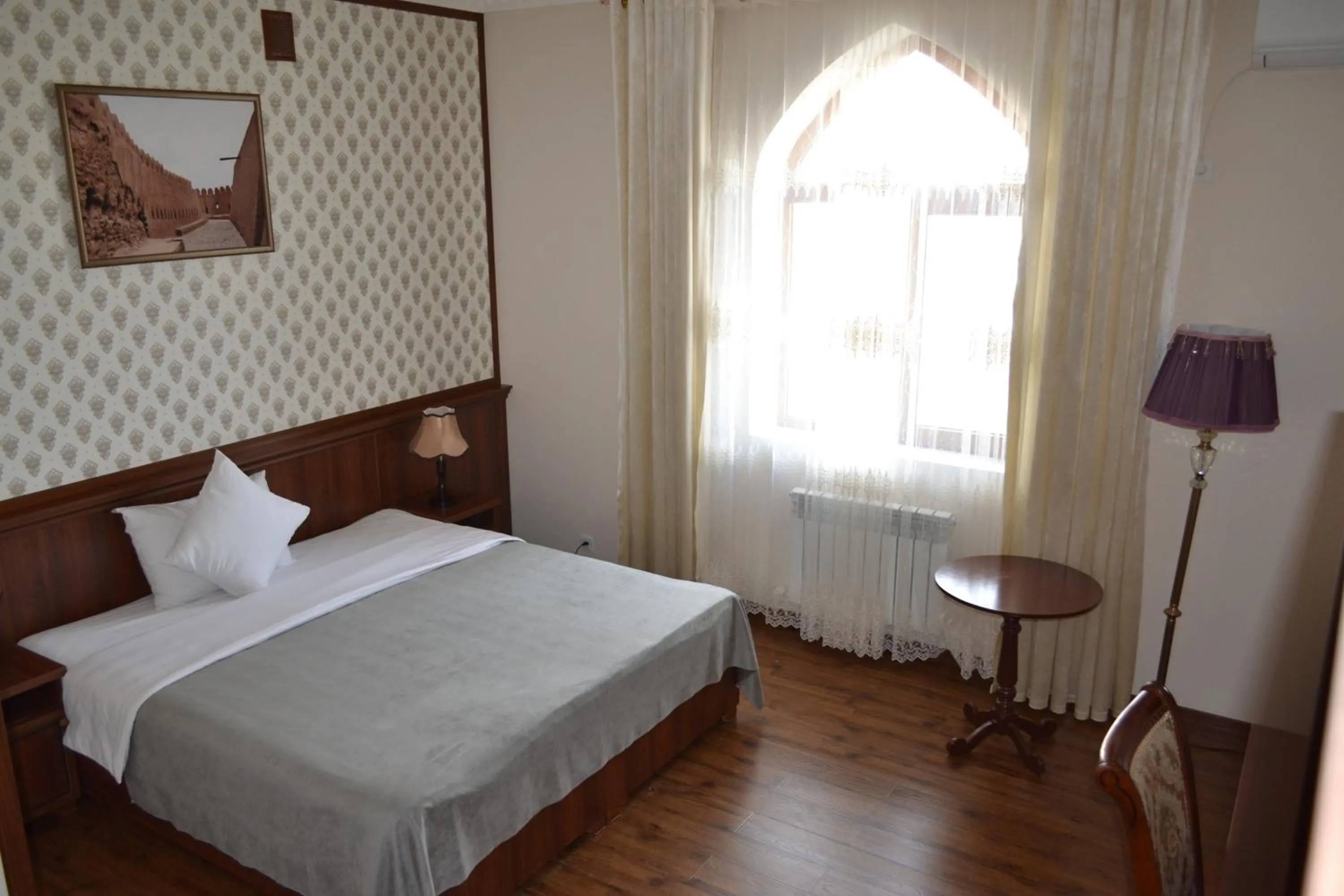 Bed in Erkin Palace Hotel