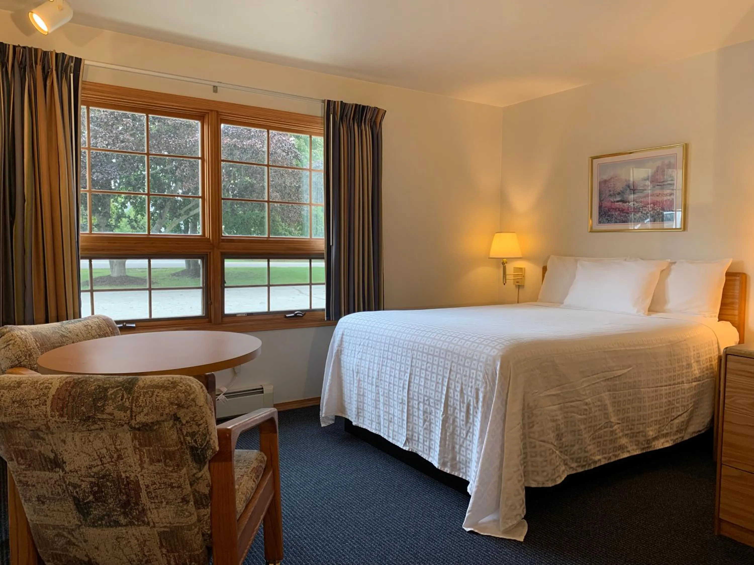 Bed in AppleCreek Resort-Hotel & Suites