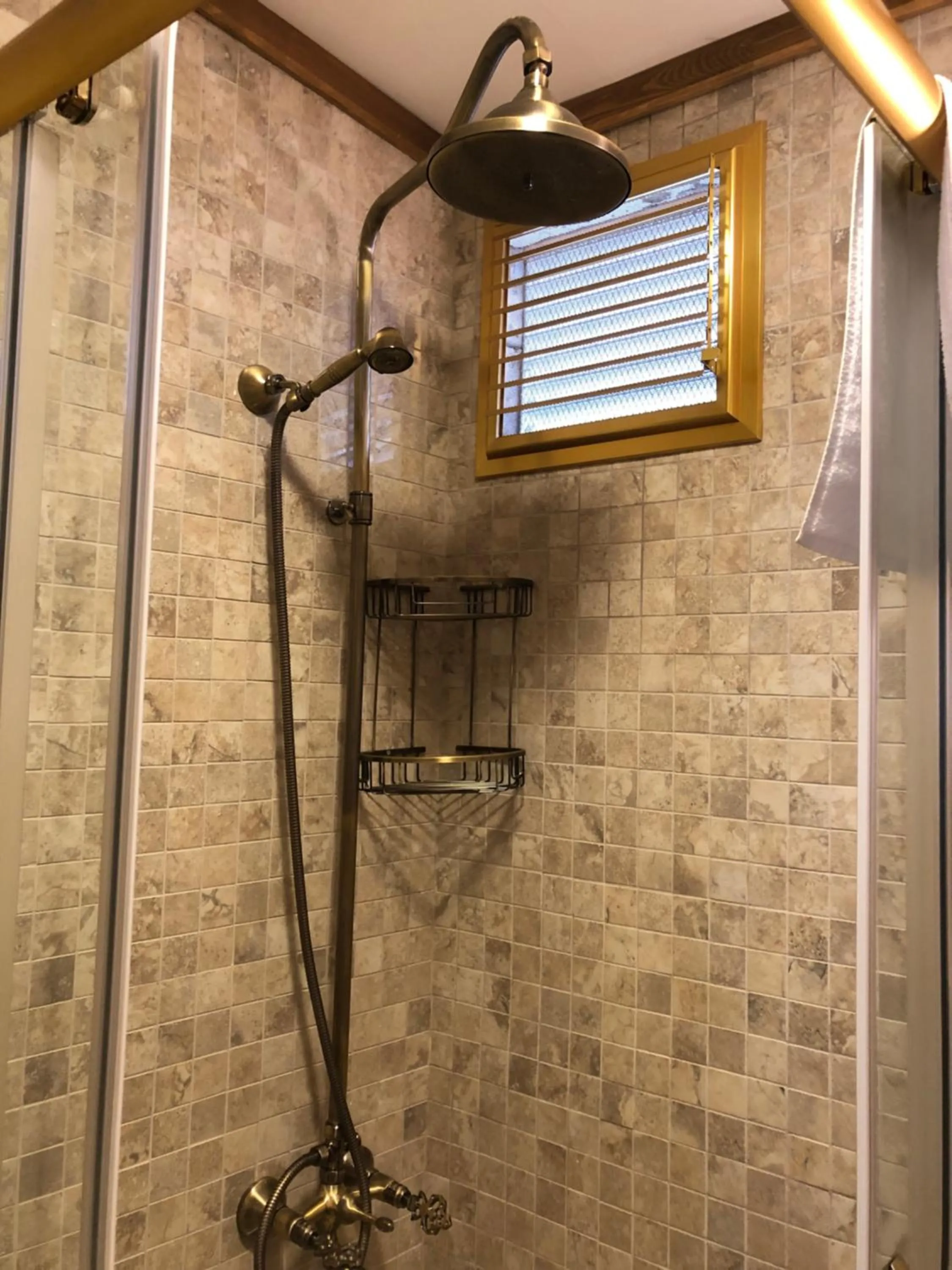 Shower in Enderun by Otantik Suites