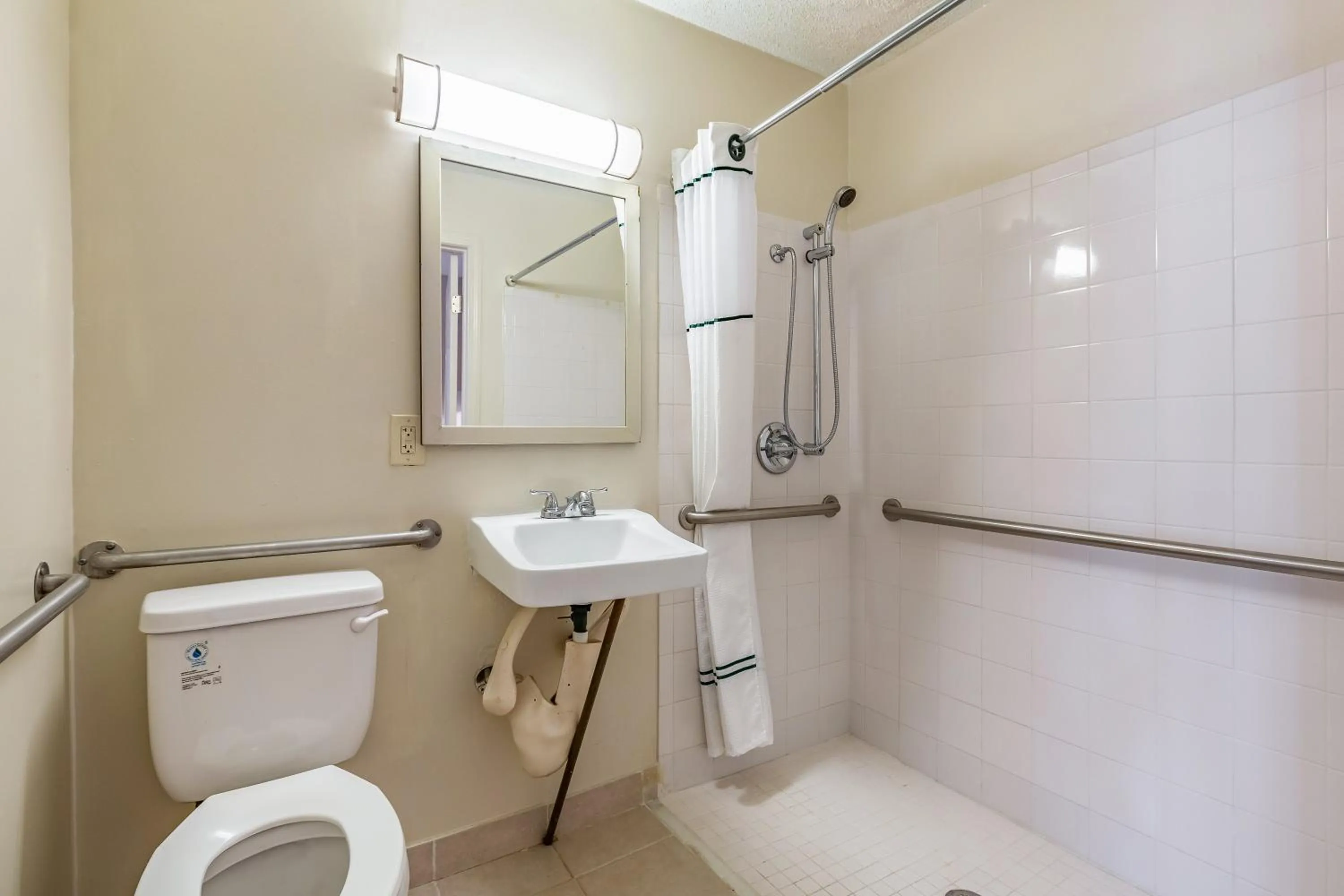 Bathroom in HomeTowne Studios by Red Roof Atlanta NE – Norcross South