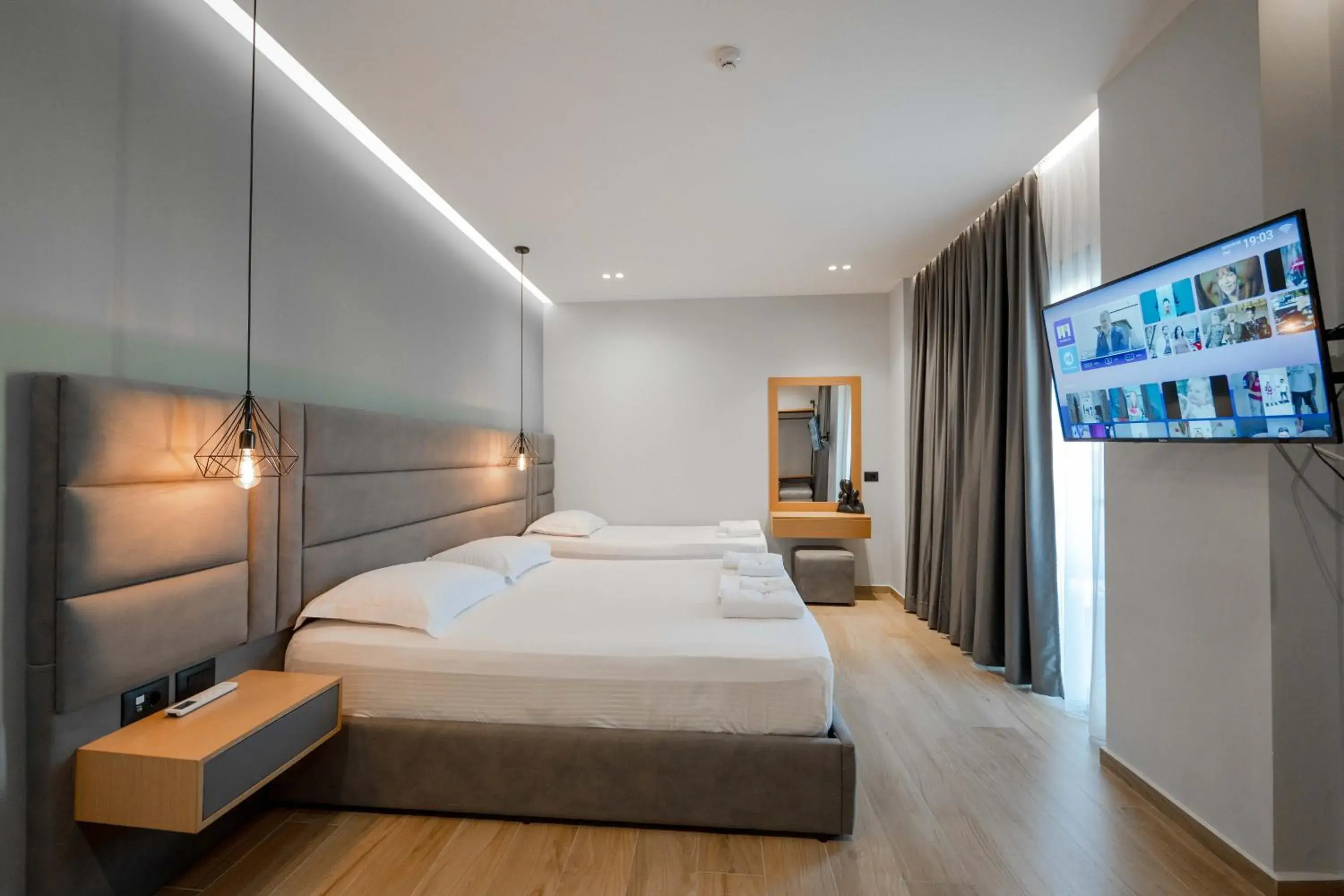 Comfort Triple Room with Balcony in Absolute Hotel Ksamil Comfort Triple Room with Balcony in Absolute Hotel Ksamil